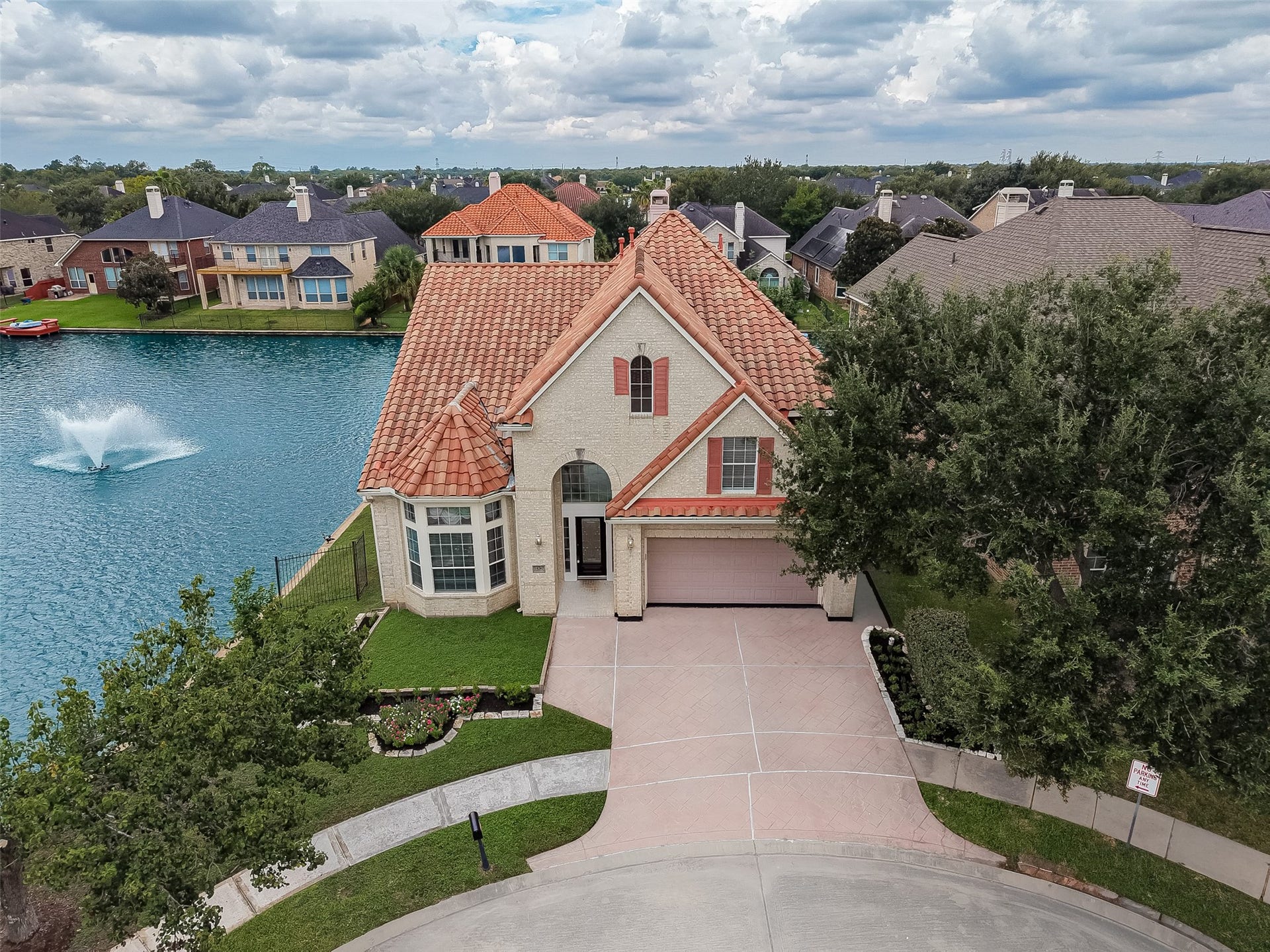 14242 Ashmore Reef Court, Sugar Land, TX 77498 One-of-a-Kind Luxury! Discover this exquisite 5-bedroom, 3-bath David Weekley home nestled in the sought-after Chelsea Harbor community. Boasting breathtaking lake views from nearly every angle, this exceptional residence offers an unparalleled blend of elegance, comfort, and sophisticated design. With thoughtfully designed living spaces and stunning views throughout, this remarkable home is truly a rare find.