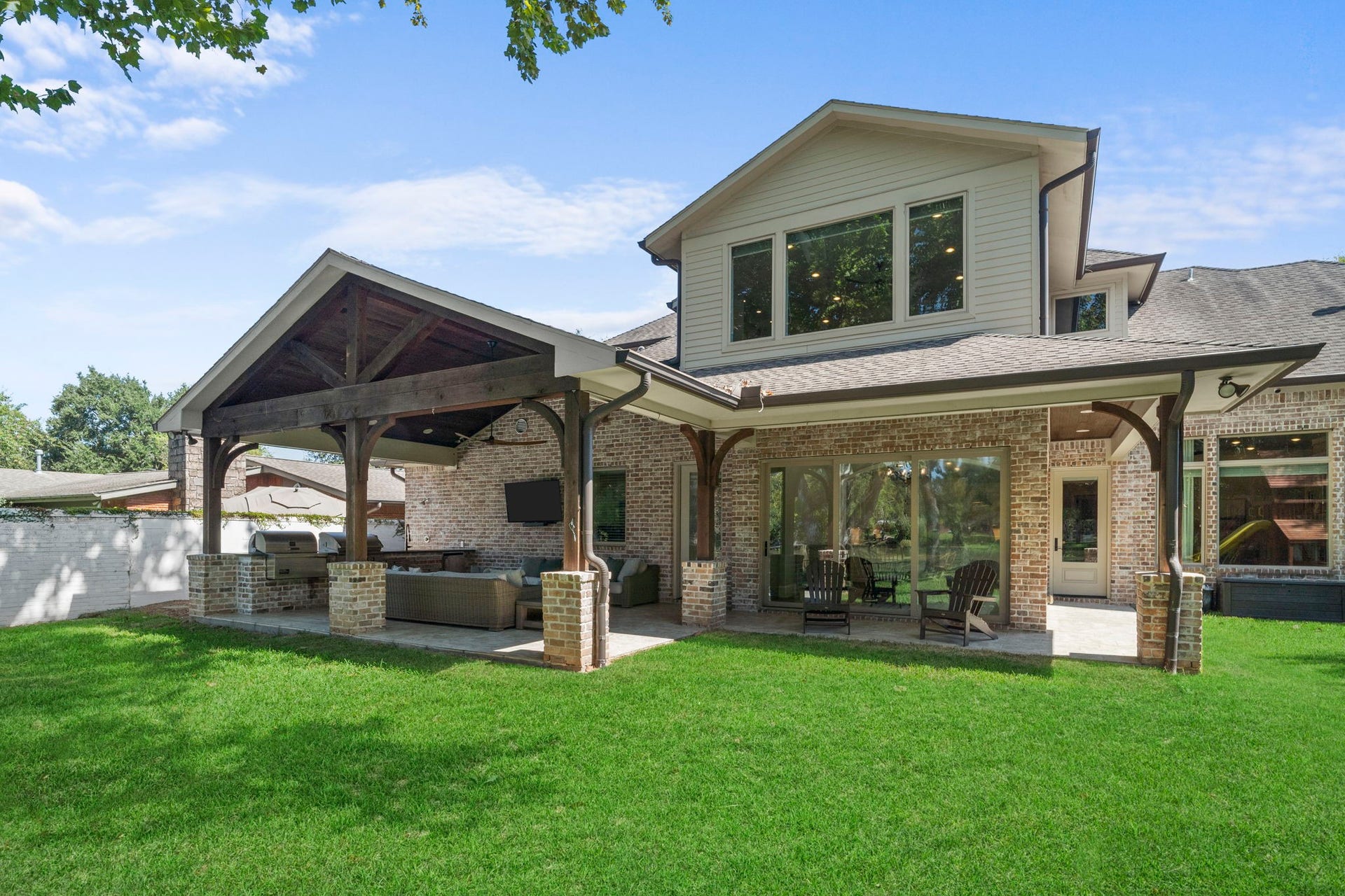 706 Oyster Creek Drive, Sugar Land, TX 77478 A built-in mosquito misting system enhances outdoor comfort, while a security alarm provides added peace of mind.