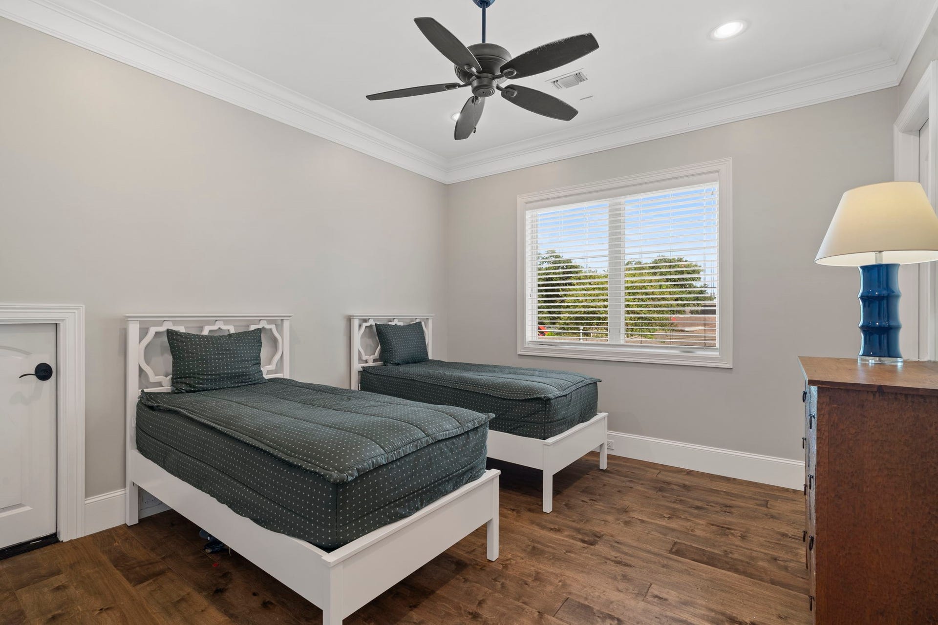 706 Oyster Creek Drive, Sugar Land, TX 77478 No carpet in the bedrooms creates a clean, cohesive look while making the spaces easy to maintain and a great choice for those sensitive to dust and allergens.