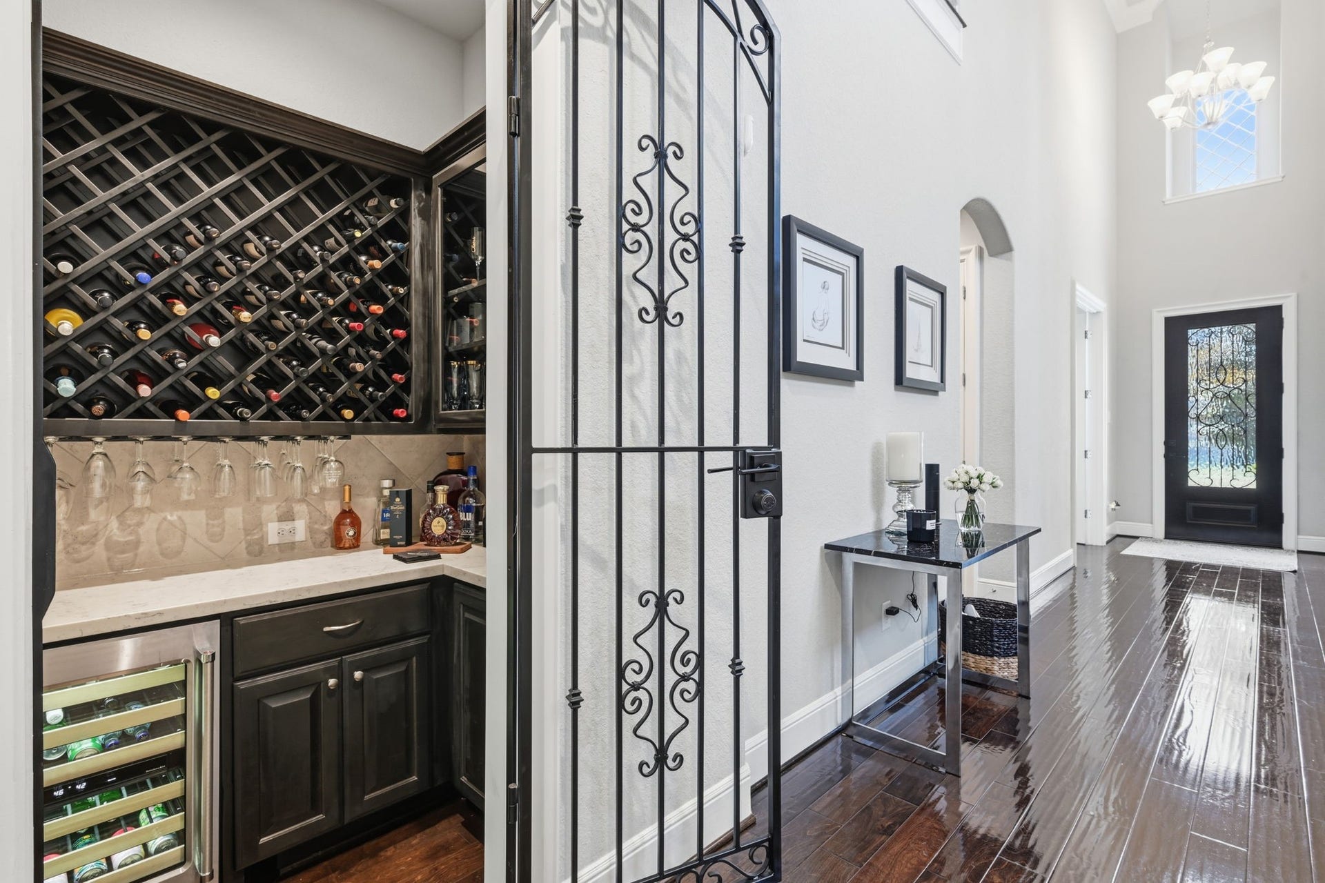 4043 Woodland Meadow Drive, Spring, TX 77386 A wine room with a drop down entry is featured central to the home.