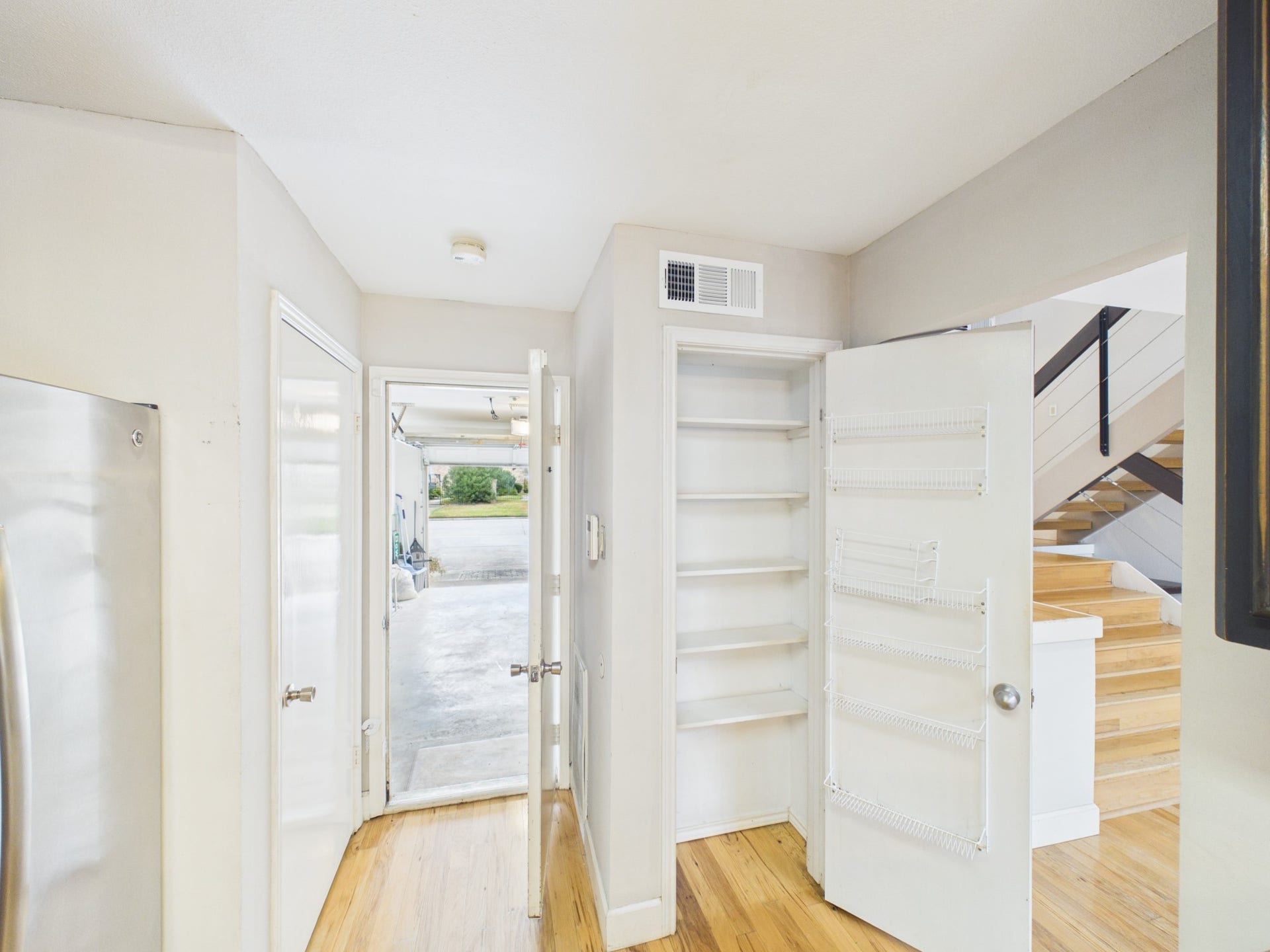 15938 Seahorse Drive, #275, Houston, TX 77062 Small Kitchen Pantry & Access to the Single Car Garage