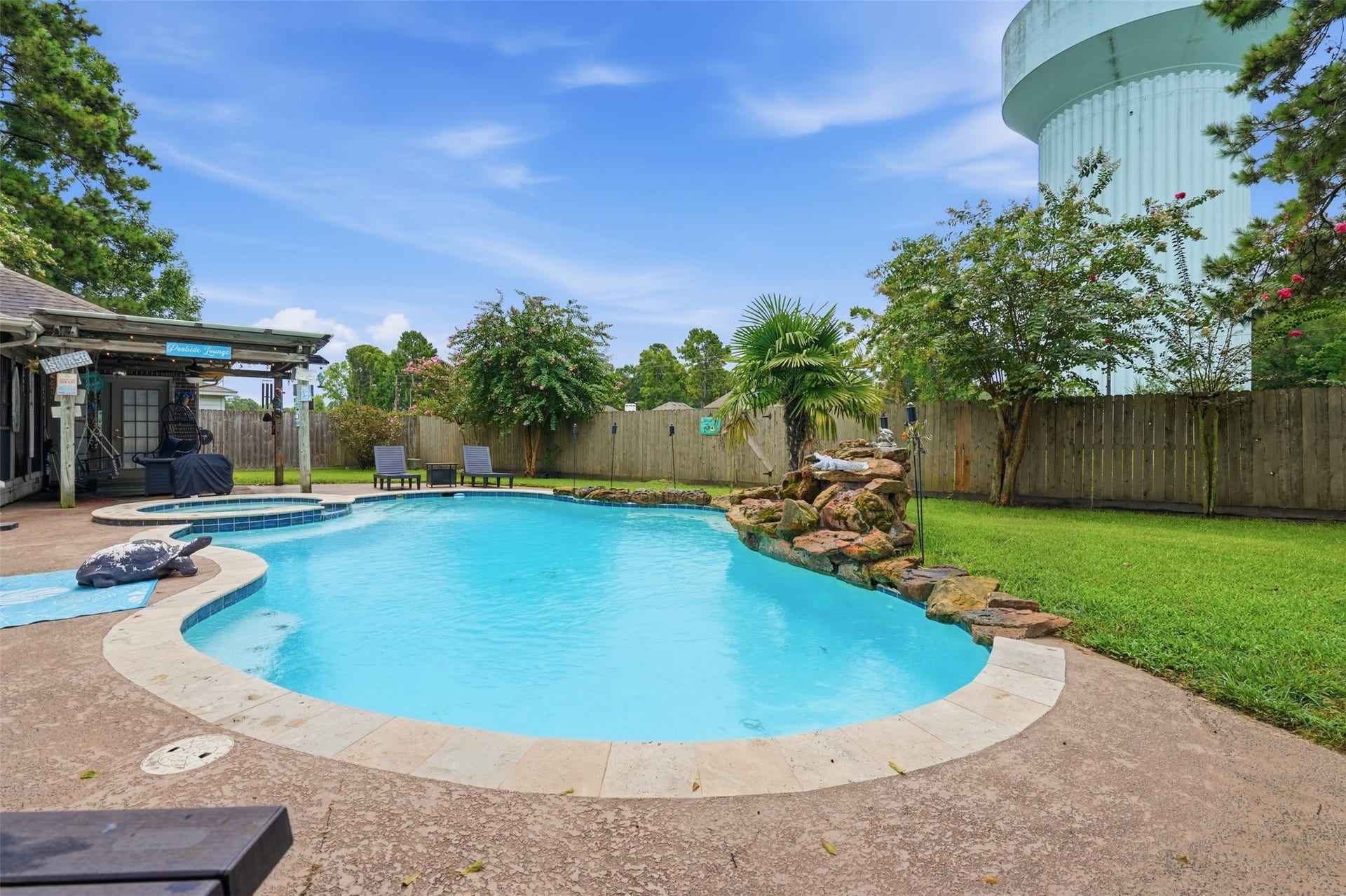 Pool has rock waterfall