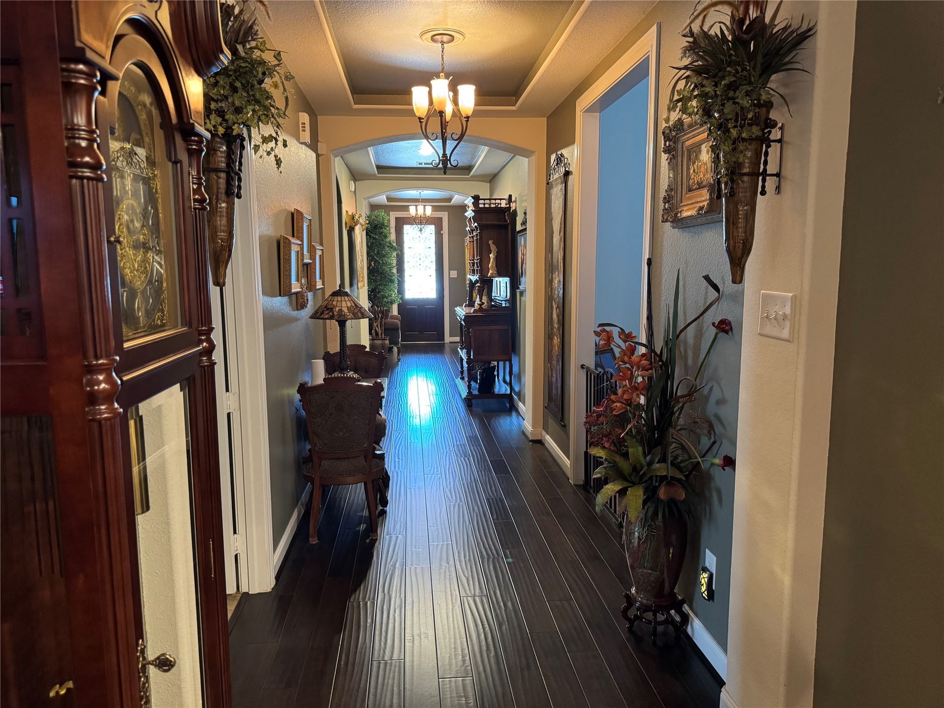 4910 Woodbury Mill Drive, Spring, TX 77389 Beautiful hallway travels from entry to den.