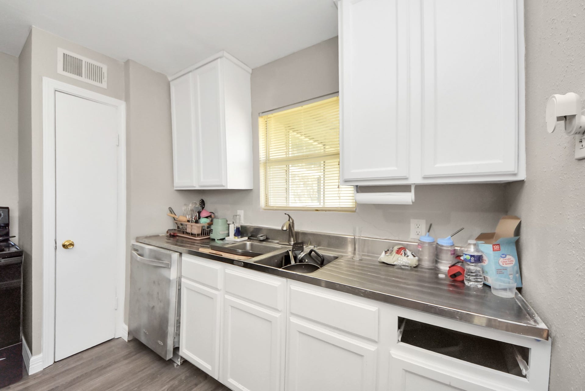 817 Church Street, Crosby, TX 77532 unit 1 kitchen sink area and pantry door