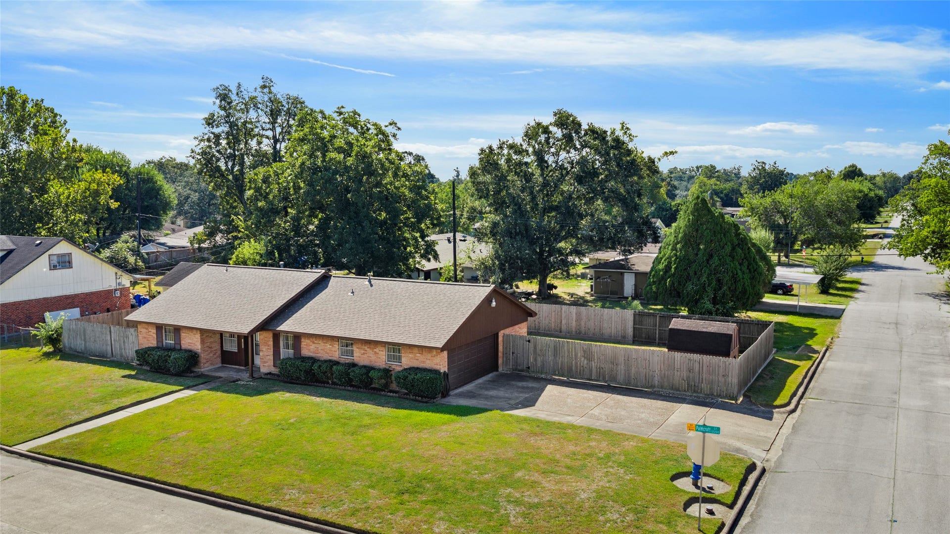Spacious corner lot with a fenced yard and side-entry 2-car garage.