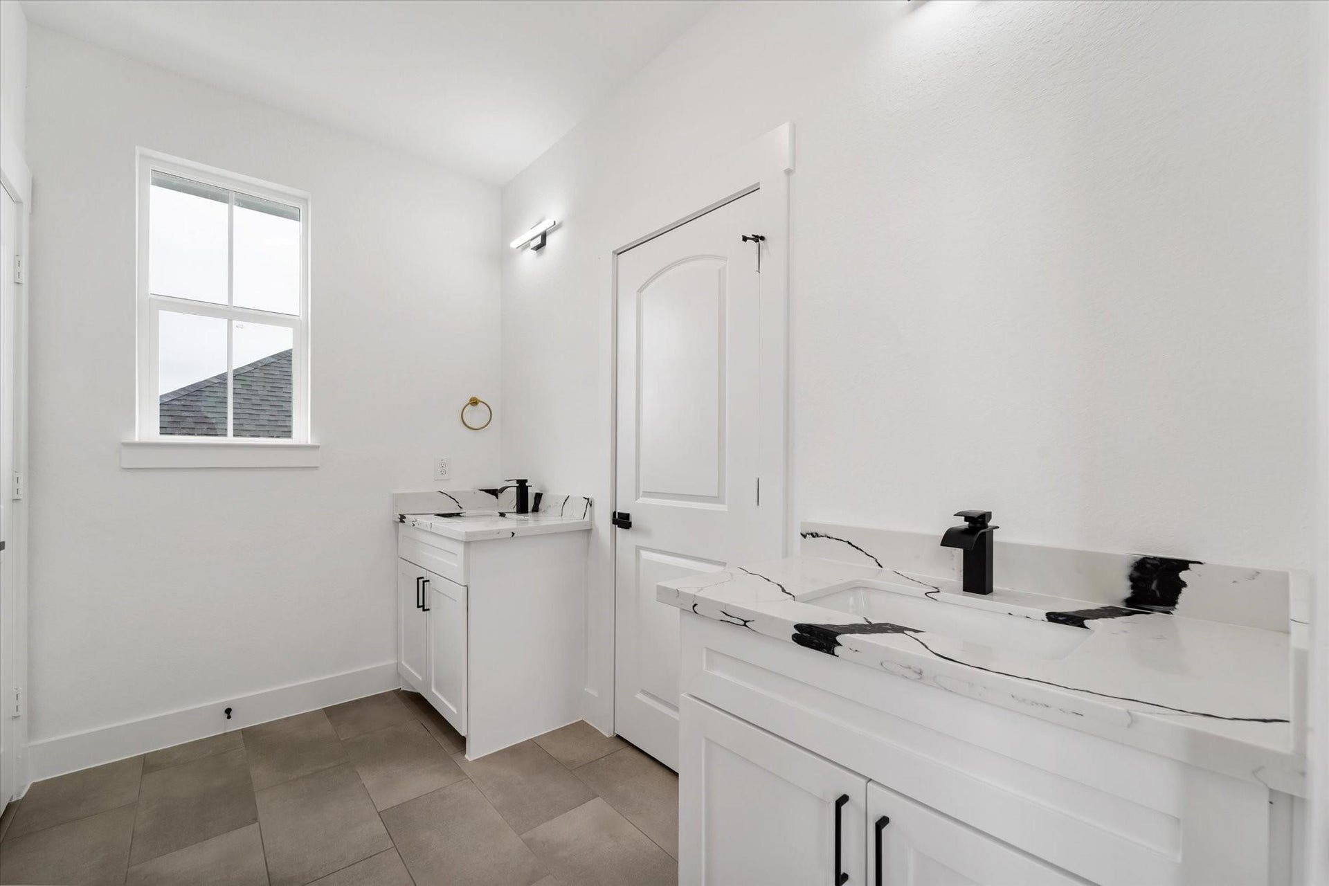 No more fighting over counter space ;) Separate vanities in the primary bath and private water closet enhance the functionality of the en-suite bathroom. (Photos of a previously built home with the same floor plan. For illustrative purposes only; final finishes may vary.)
