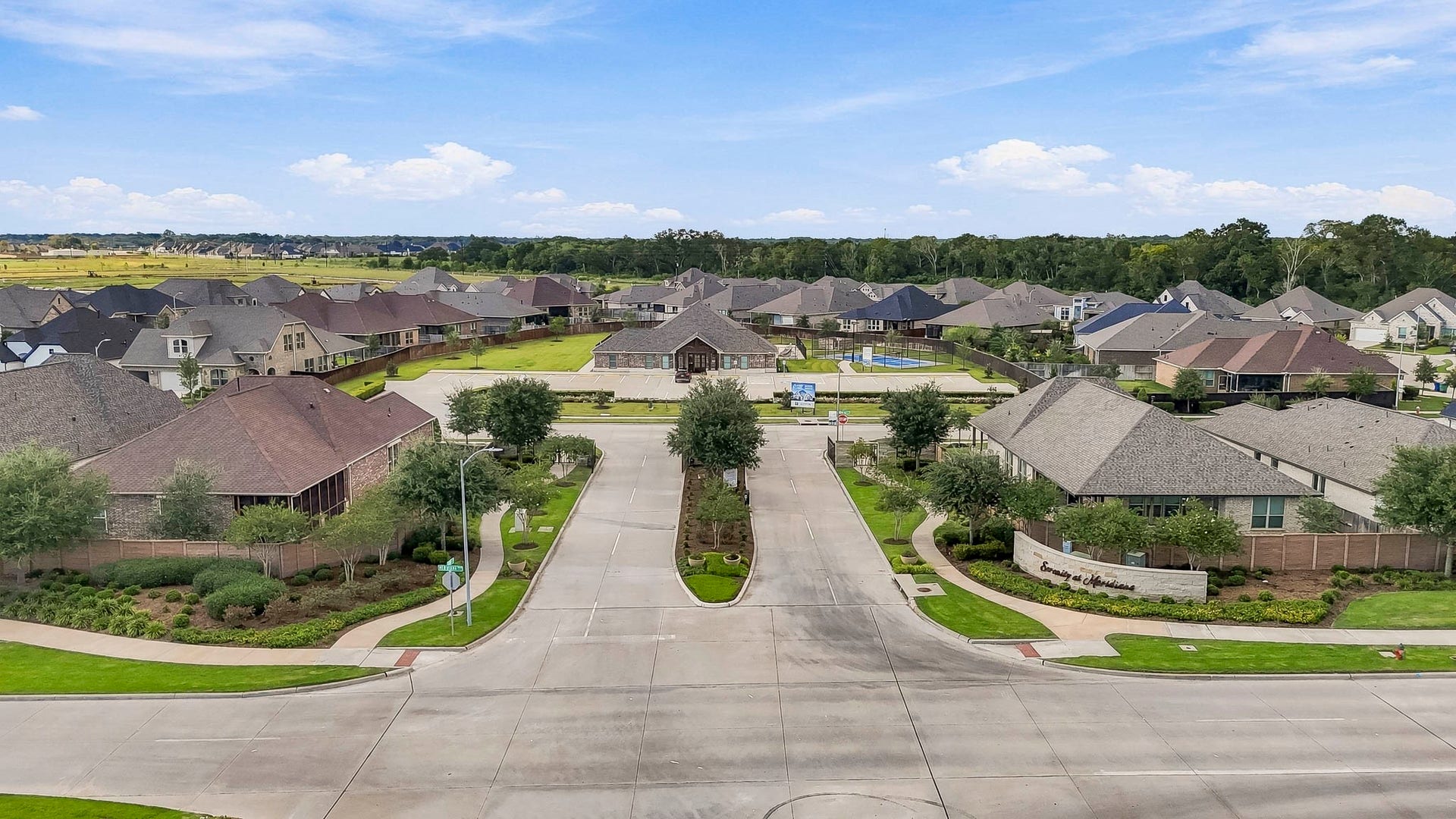 9527 Waxwing Trace, Manvel, TX 77578 Gated entrance to Serenity at Meridiana.