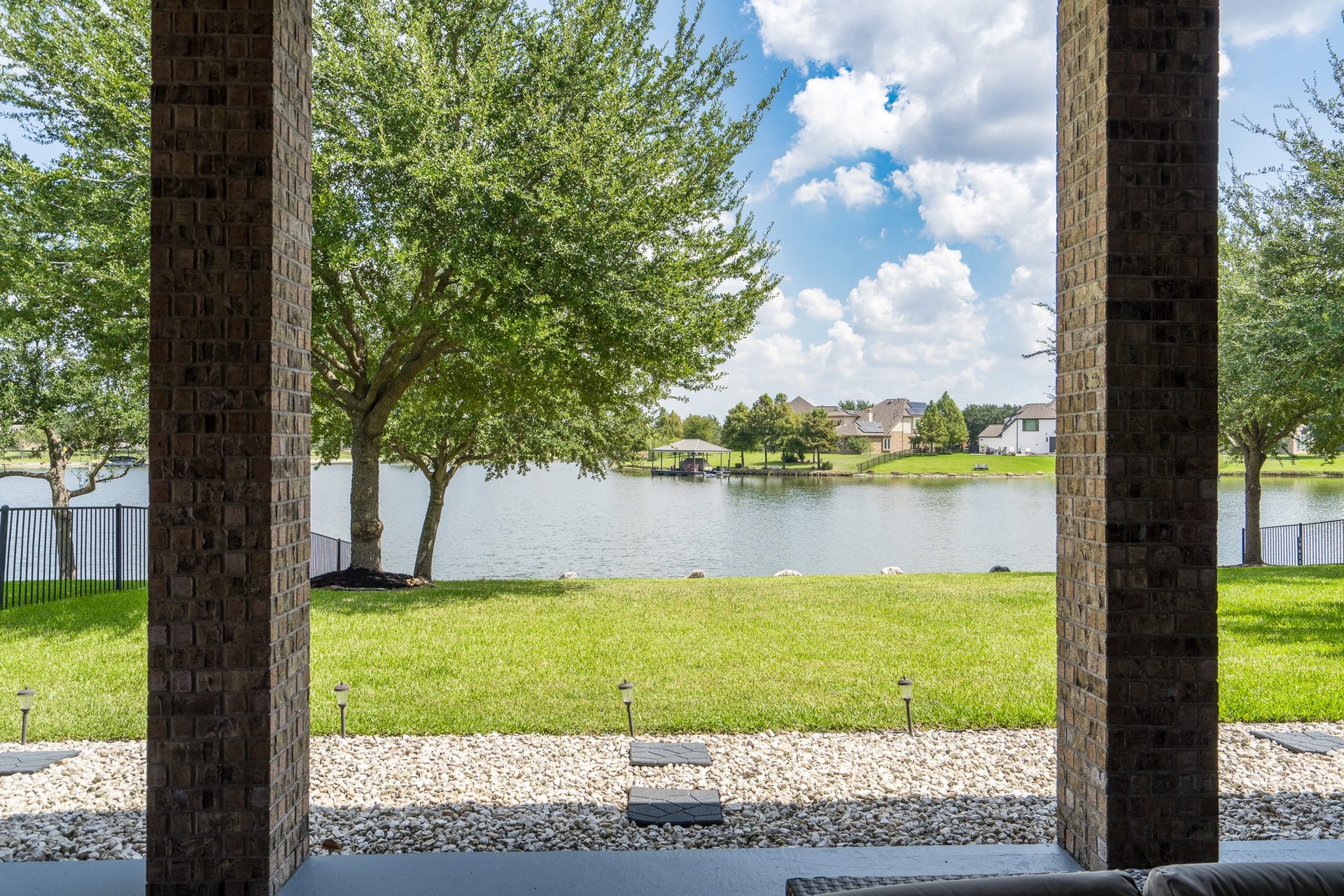 9618 W Pedernales River Drive, Cypress, TX 77433 Relaxing, peaceful view. Owners added landscaping lighting and bull rock.