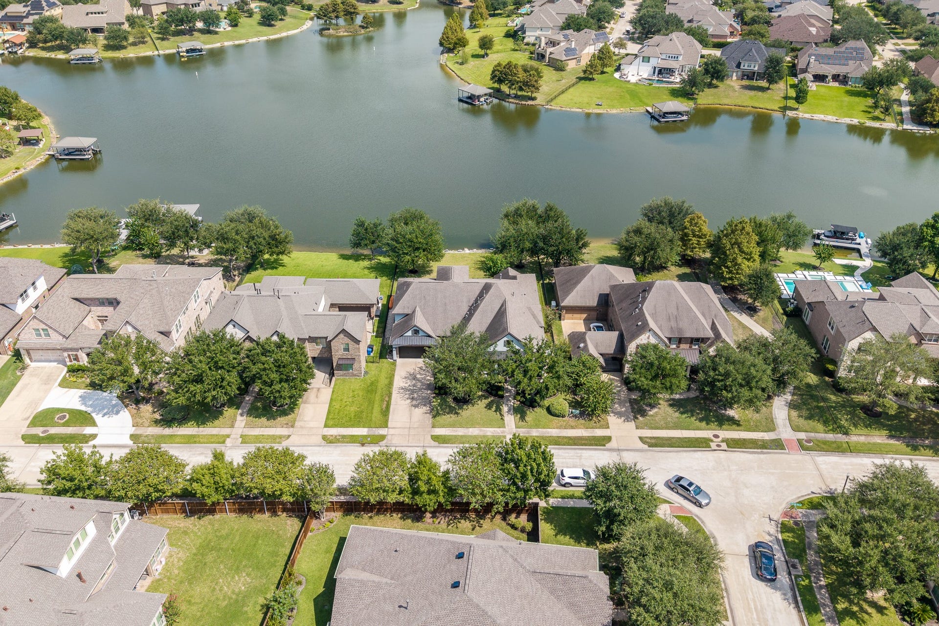 9618 W Pedernales River Drive, Cypress, TX 77433 Situated right on the water with a lot size of 10,660.