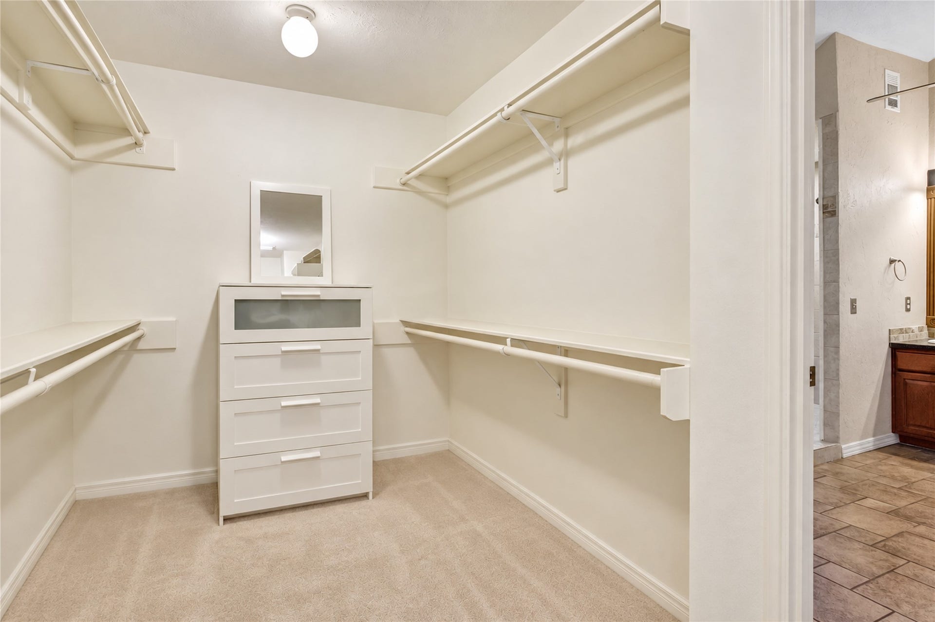 2826 Spring Lakes, Missouri City, TX 77459 A generous walk-in closet with enough space on both sides means no more fighting over closet space.