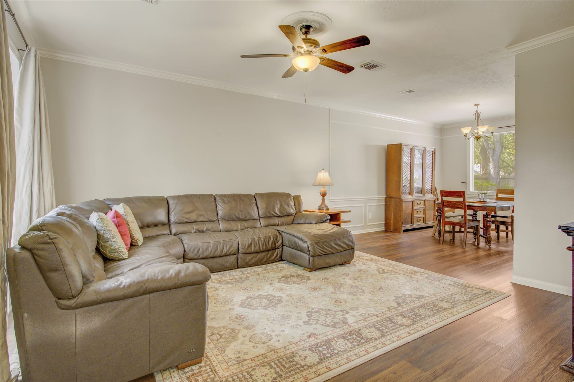 2826 Spring Lakes, Missouri City, TX 77459 Picture movie nights on the sofa while dinner is set in the formal dining room just steps away. New LVP flooring runs throughout the first floor.