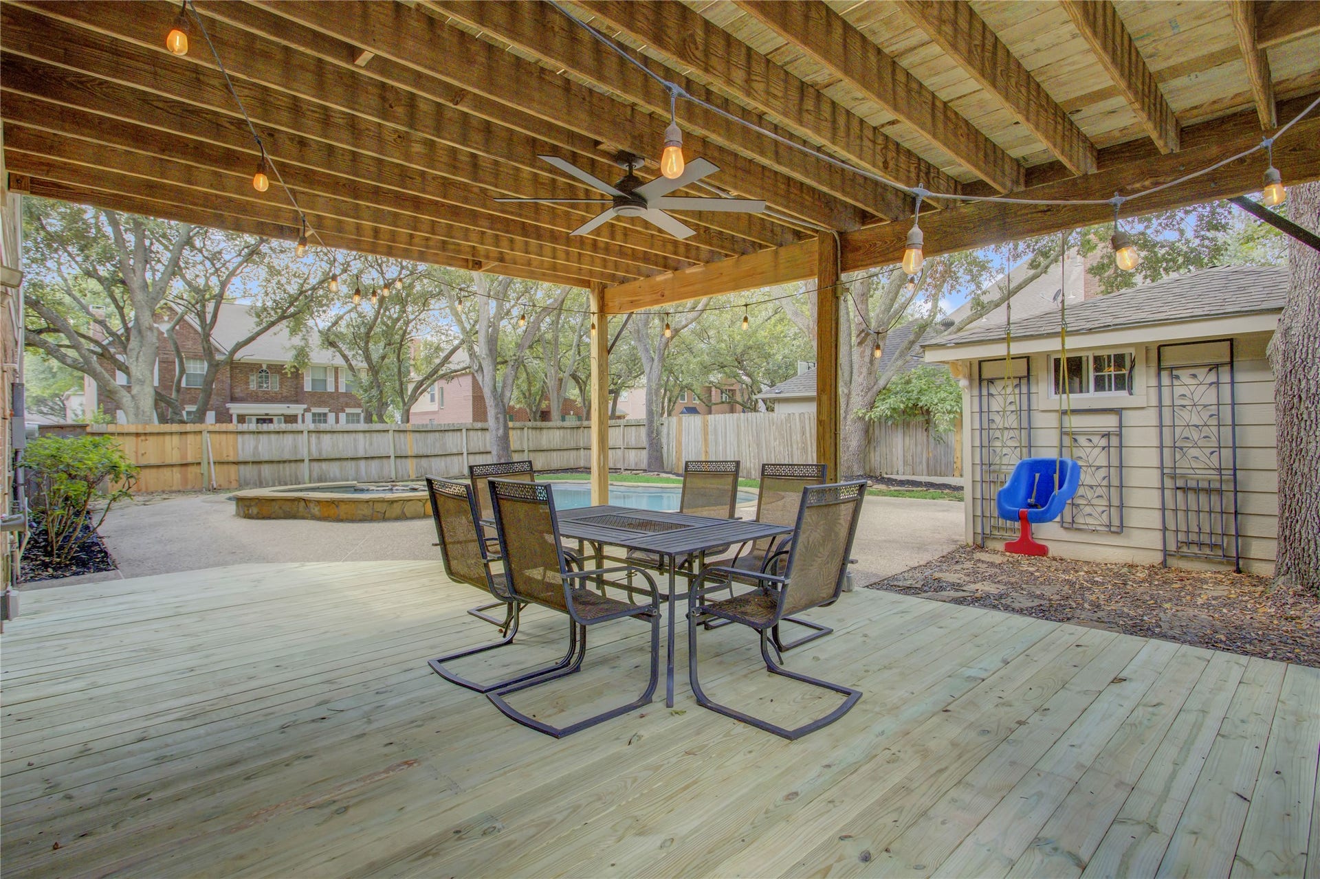 2826 Spring Lakes, Missouri City, TX 77459 Picture summer evenings under the covered patio, entire deck flooring and ceiling fan are brand new.