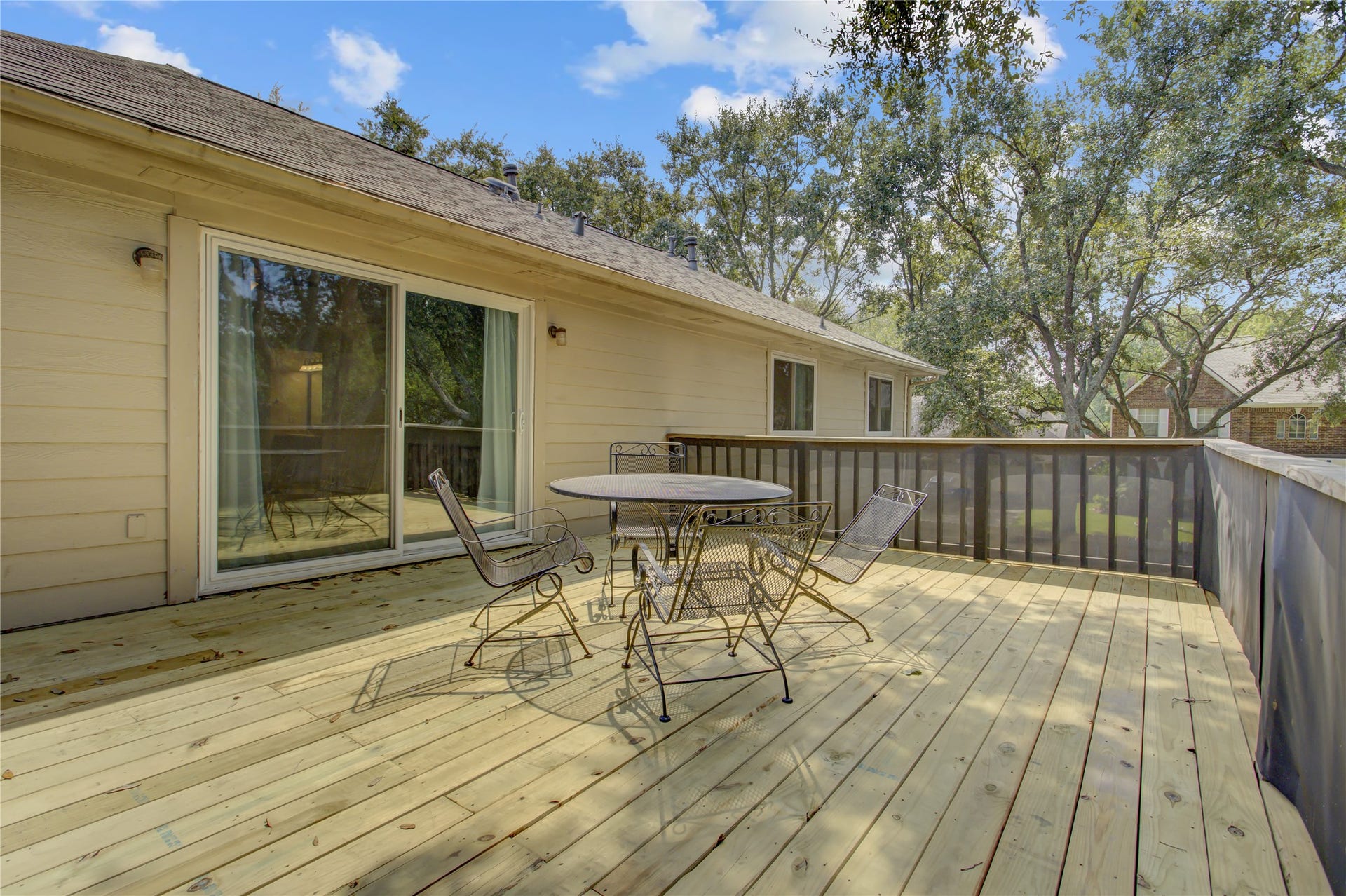 2826 Spring Lakes, Missouri City, TX 77459 The newly replaced balcony deck is a peaceful spot to start the day or wind down with a glass of wine.