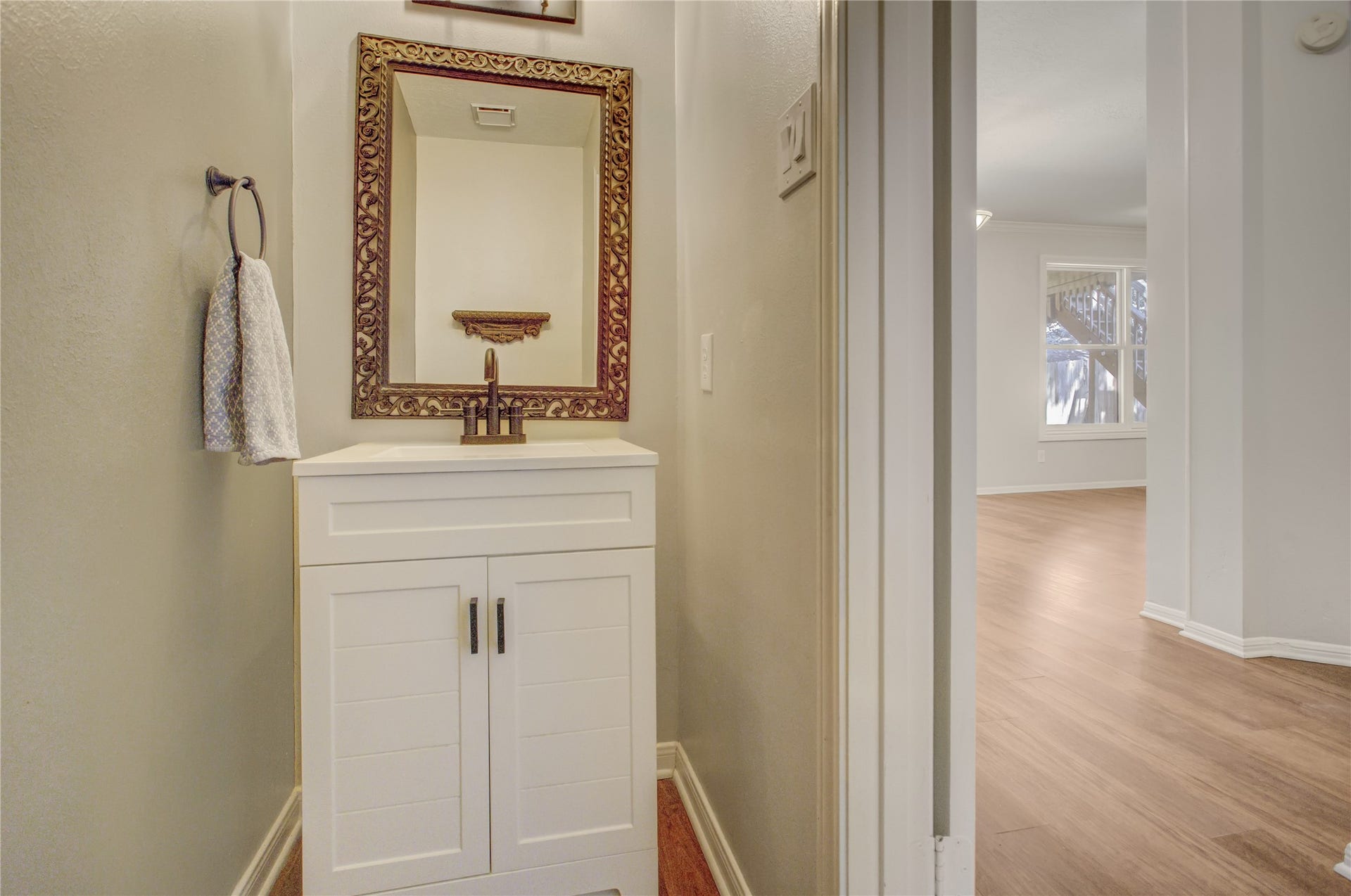 2826 Spring Lakes, Missouri City, TX 77459 A recently refreshed powder room is on the main floor for guests.