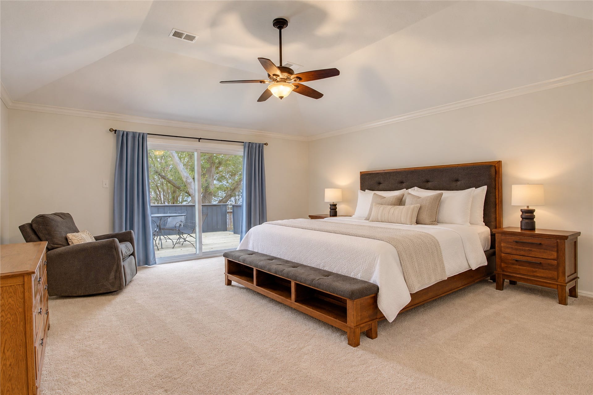 2826 Spring Lakes, Missouri City, TX 77459 Your own retreat upstairs: this spacious primary suite's sliding doors open to a private balcony for morning coffee in the treetops.