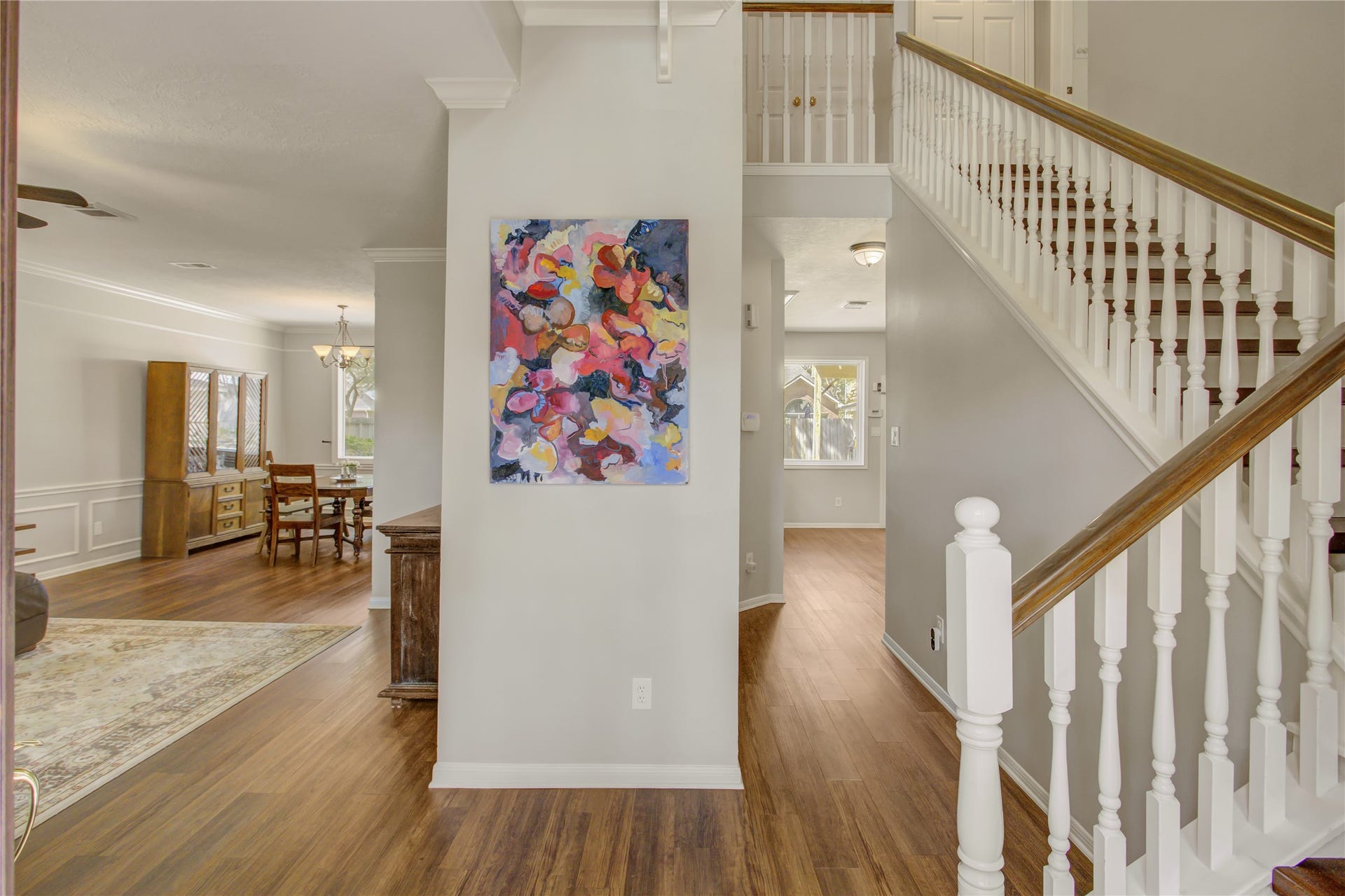 2826 Spring Lakes, Missouri City, TX 77459 The two-story foyer opens straight into the living and dining rooms, so the house feels open and bright from the moment you walk in.