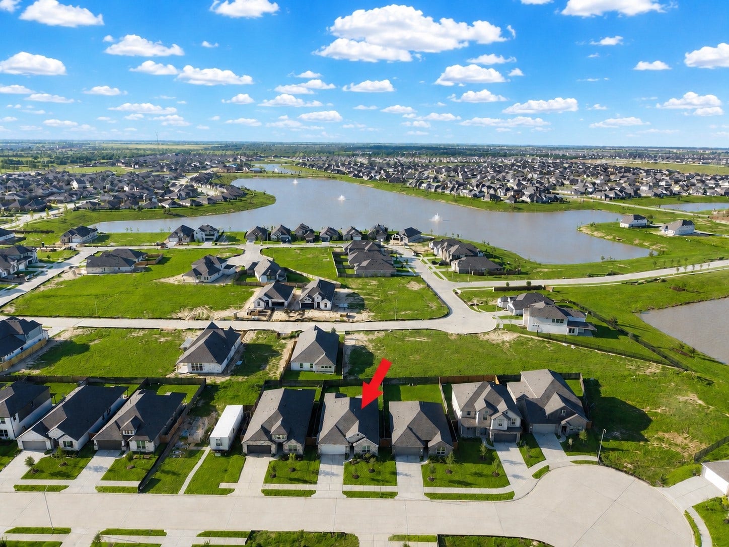 4724 Peony Green Drive, Katy, TX 77493 Aerial view showing one of the many water features throughout the community