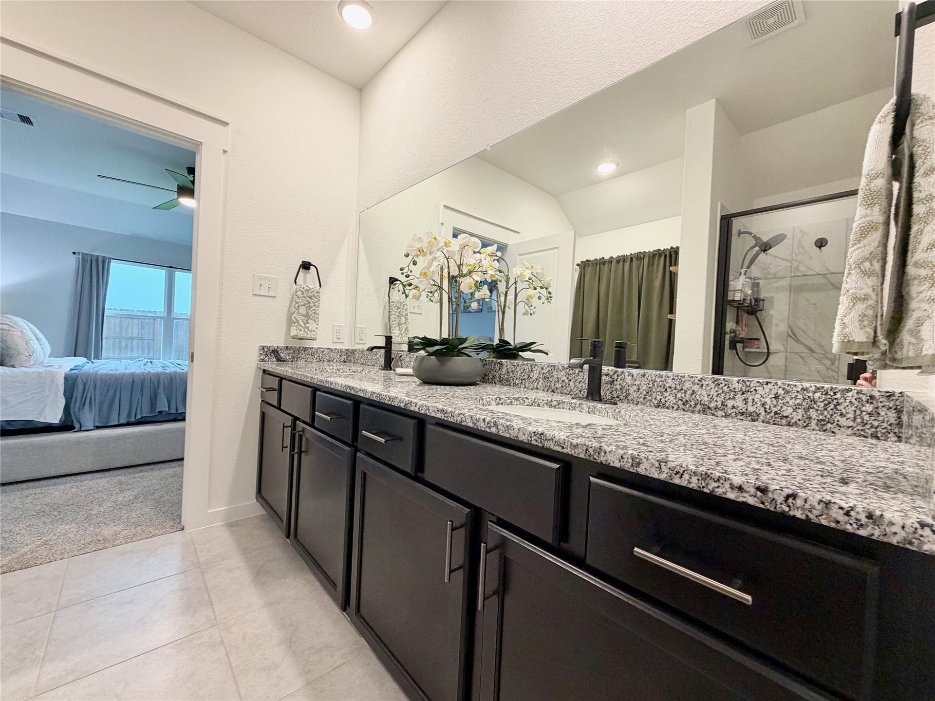 4724 Peony Green Drive, Katy, TX 77493 Large vanity area with granite countertops