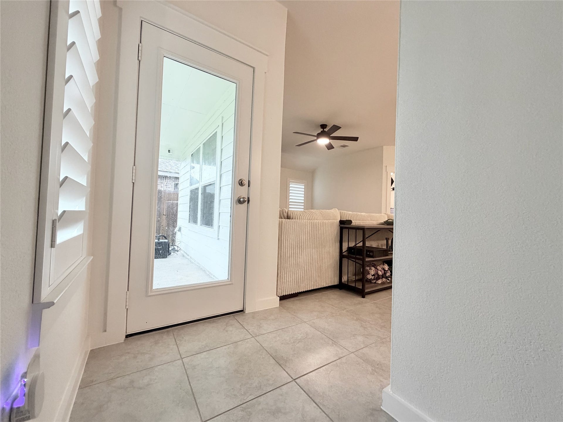 4724 Peony Green Drive, Katy, TX 77493 View from Primary Bedroom entryway, showing backdoor patio exit