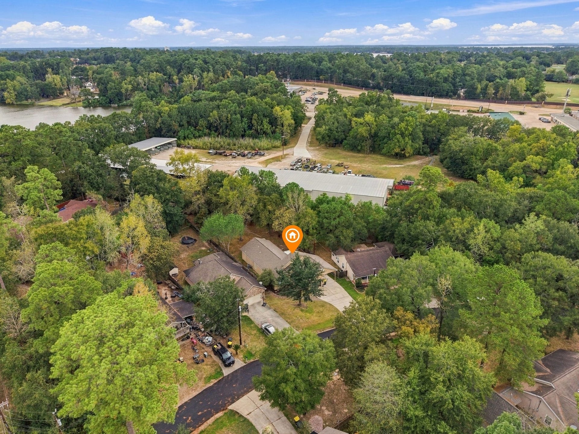306 Sherwood Forest Street, Conroe, TX 77316 A quiet residential setting offers the space and privacy of a larger lot while keeping Lake Conroe just minutes away.