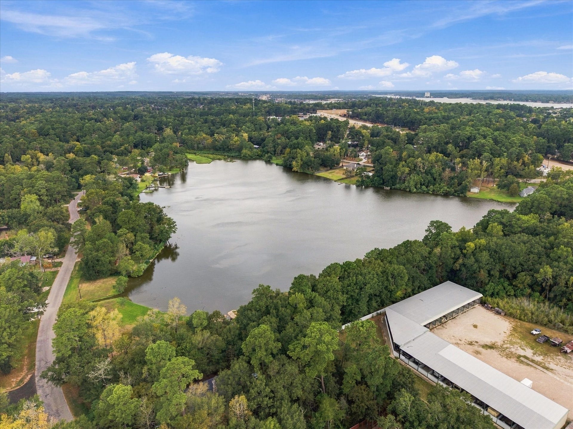 306 Sherwood Forest Street, Conroe, TX 77316 Lake Conroe offers a scenic setting nearby, with easy access to the water and surrounding recreational opportunities.
