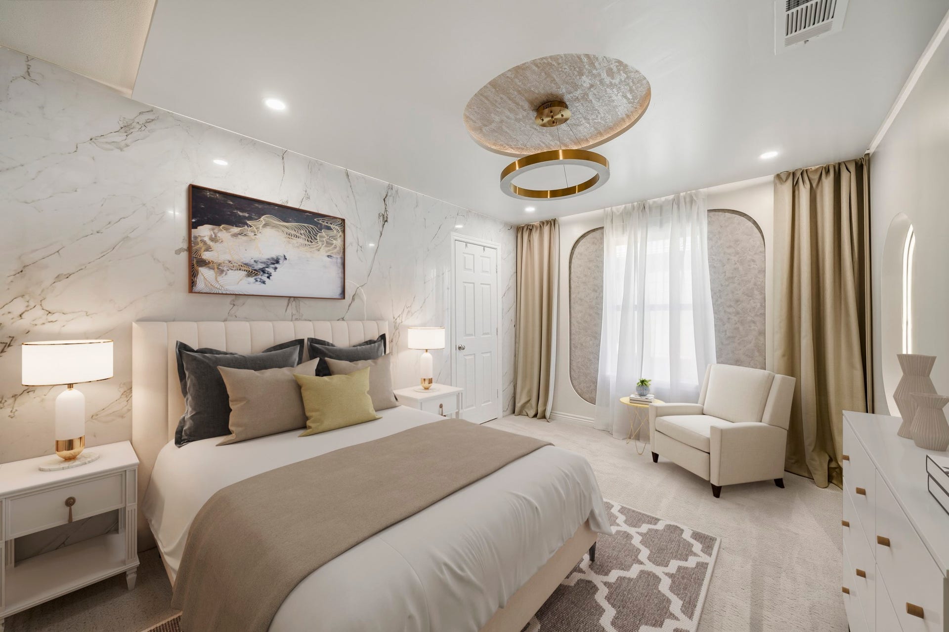 Virtually Staged: This beautifully appointed secondary bedroom features elegant marble-inspired wall accents, recessed lighting, and a striking contemporary light fixture that creates an upscale feel. A large window brings in natural light, while plush carpeting and a neutral palette keep the space bright and inviting. The generous layout provides room for additional seating and storage, creating a comfortable and stylish retreat.