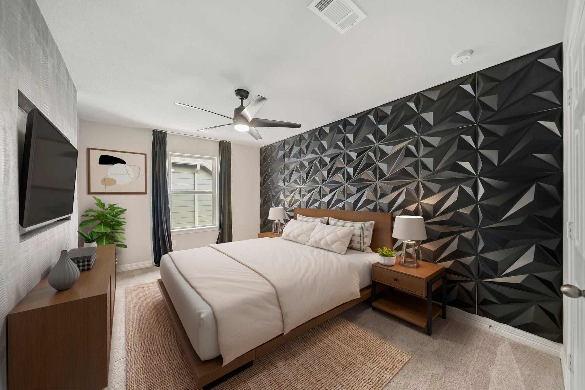 Virtually Staged: This stylish secondary bedroom features a bold geometric accent wall that adds a modern, distinctive touch to the space. Neutral carpeting, abundant natural light, and a ceiling fan create a comfortable atmosphere, while the well-proportioned layout offers plenty of room for a full bedroom setup.