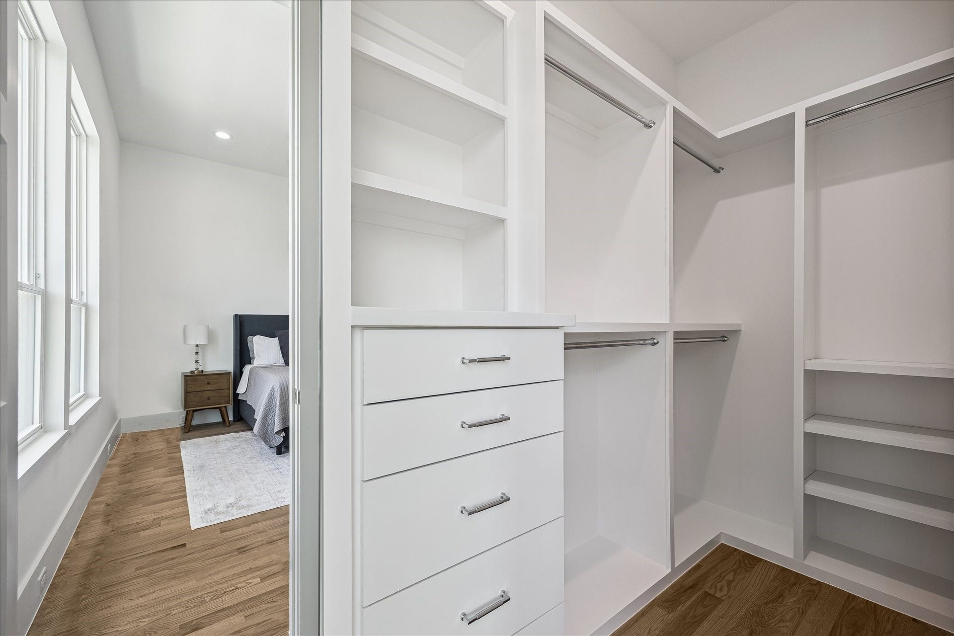 310 Fowler Street, Houston, TX 77007 Oversized walk-in closet with custom built-ins and exceptional storage.