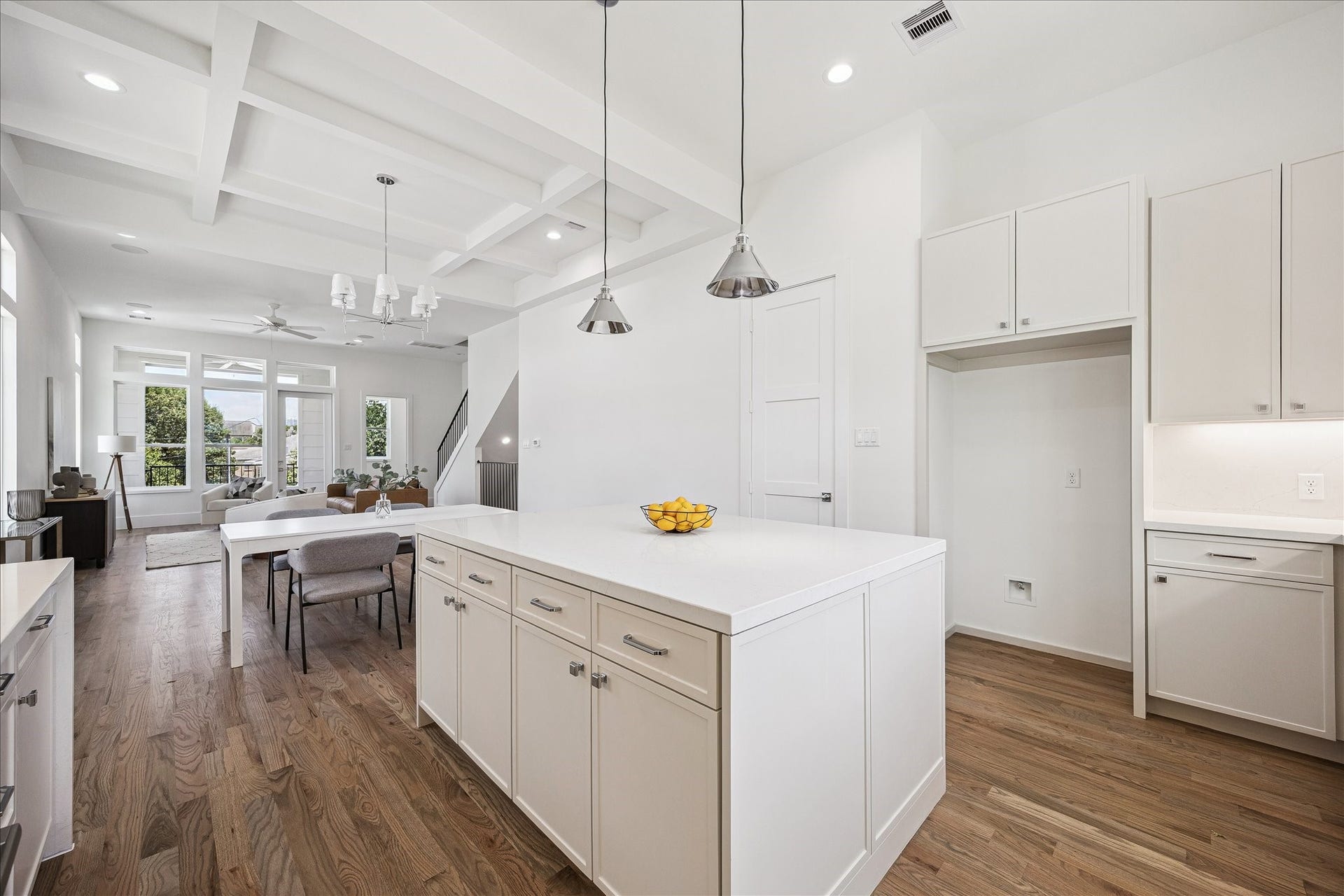 310 Fowler Street, Houston, TX 77007 Ideal layout with the kitchen opening seamlessly to dining and living spaces.