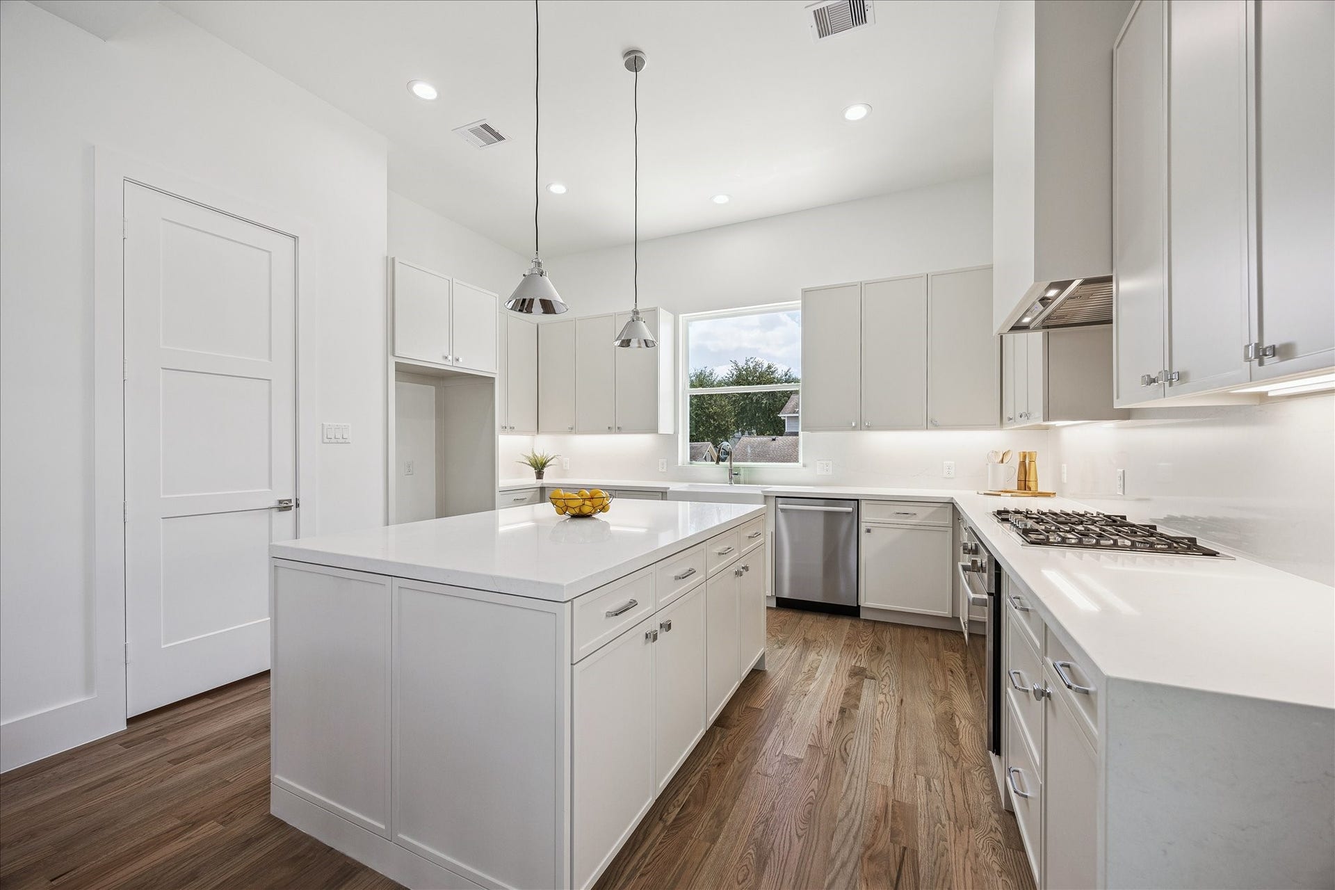 310 Fowler Street, Houston, TX 77007 Thoughtfully designed kitchen with generous prep space and storage.