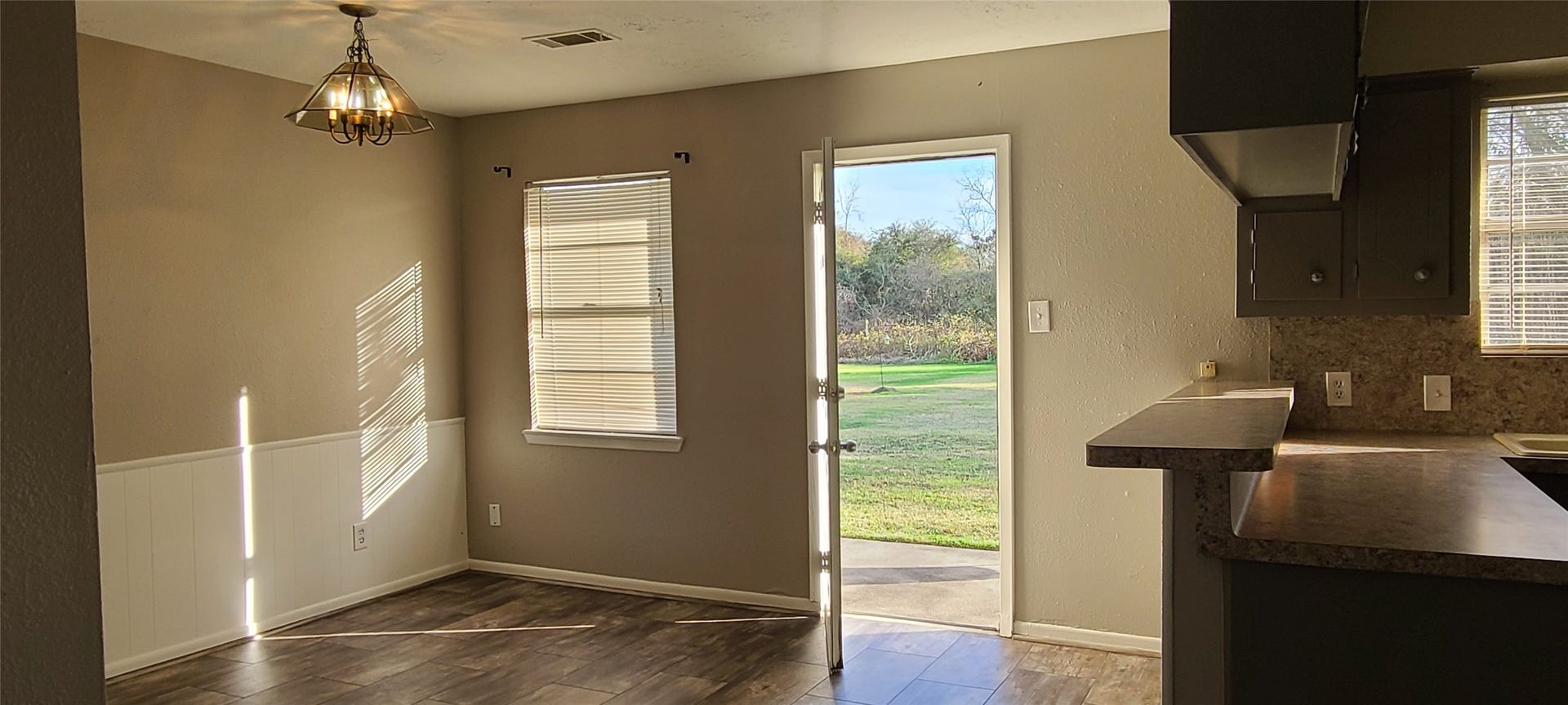 17419/17421-17423/17425 Fir Road, Alvin, TX 77511 Dining Area with Kitchen To Right