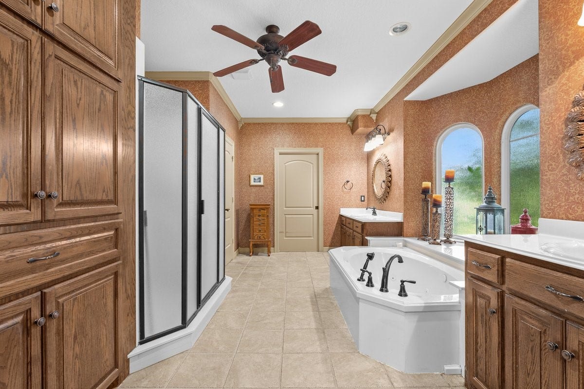 1303 China Grove Drive, Rosharon, TX 77583 Large Soaking Tub with a beautiful window view.