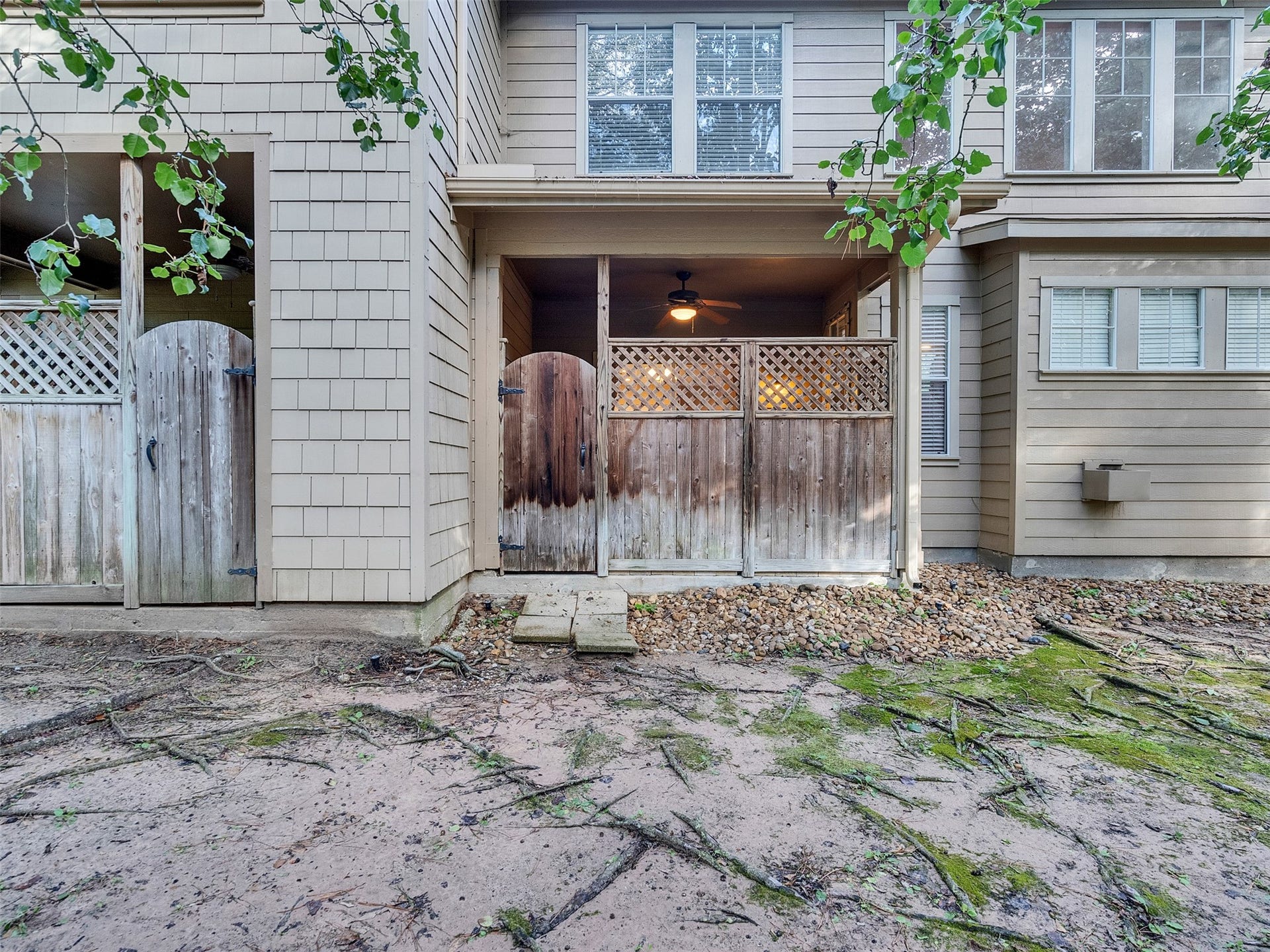 83 Scarlet Woods Court, #83, The Woodlands, TX 77380 Access to common areas from patio.