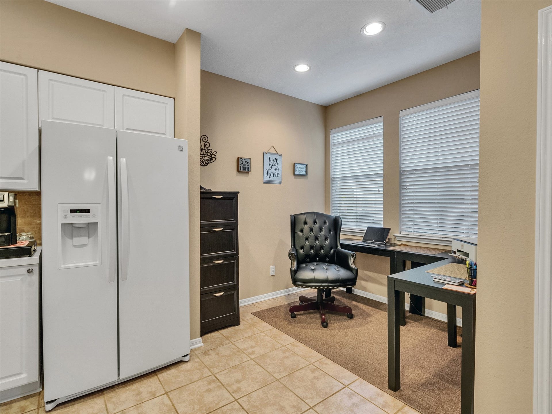 83 Scarlet Woods Court, #83, The Woodlands, TX 77380 Office/workspace with desk, printer and file storage located just off the kitchen.