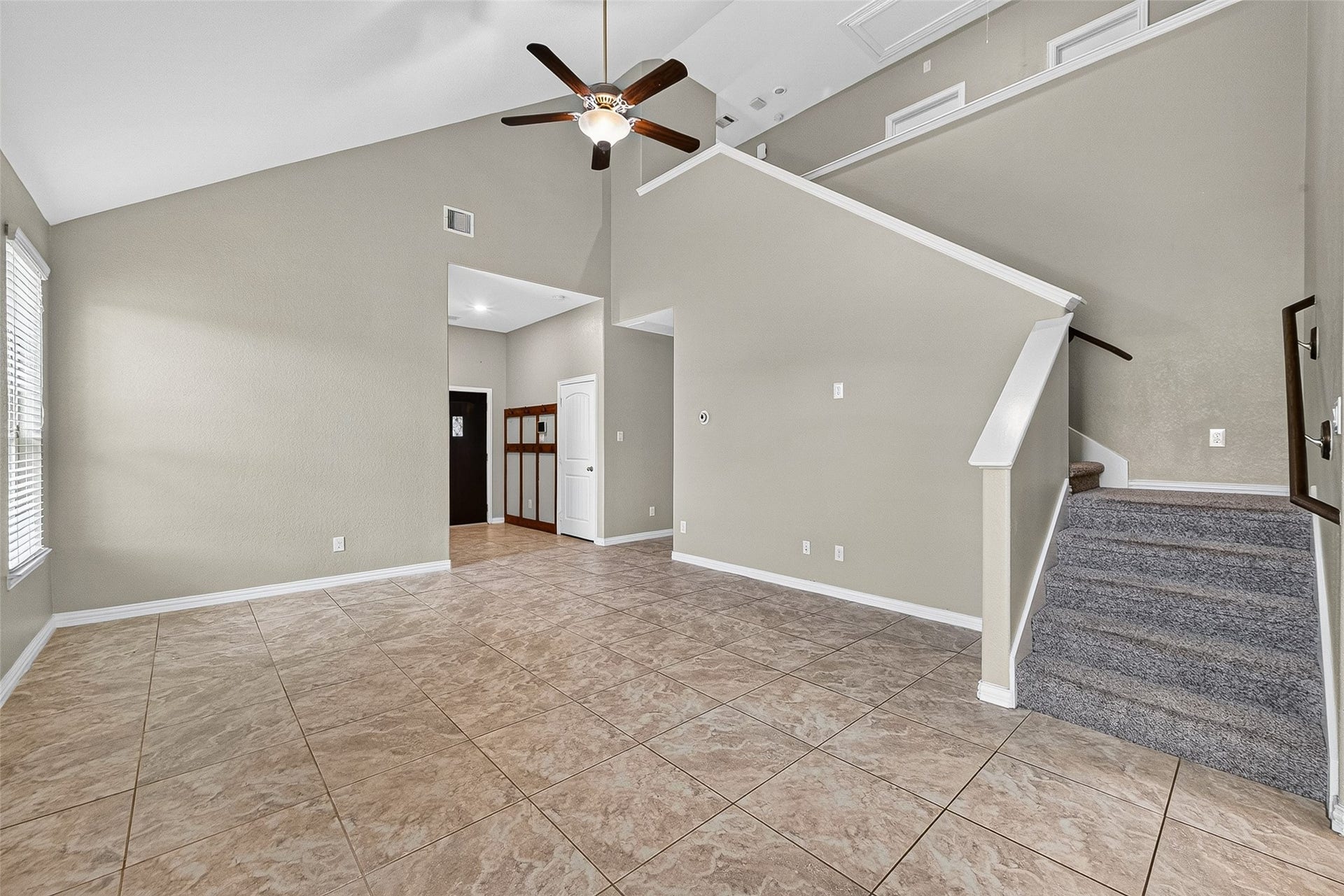 23010 Tindarey Falls Lane, Katy, TX 77493 Living room looking towards upstairs