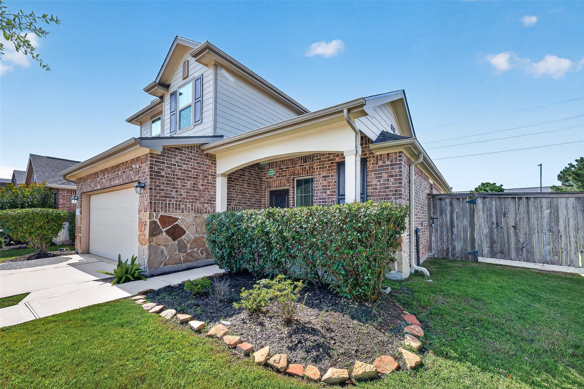 23010 Tindarey Falls Lane, Katy, TX 77493 Large Shrubs welcoming front porch