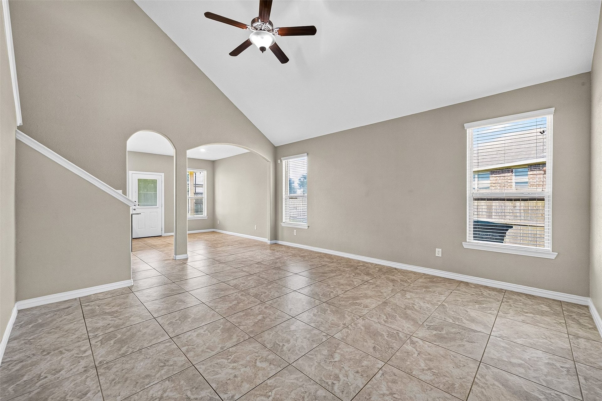 23010 Tindarey Falls Lane, Katy, TX 77493 Living room with ceiling fan