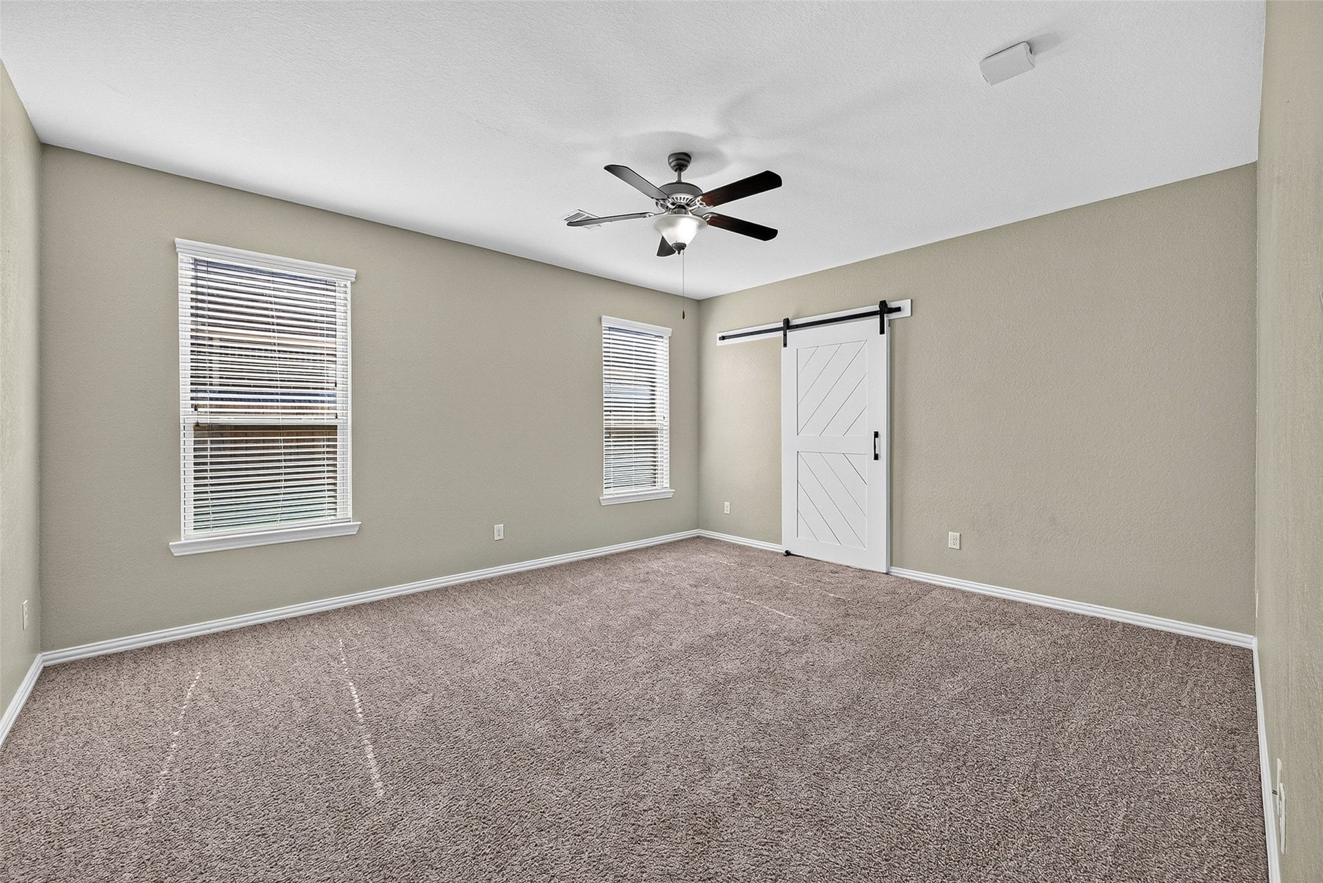 23010 Tindarey Falls Lane, Katy, TX 77493 Primary Bedroom with Barn Door
