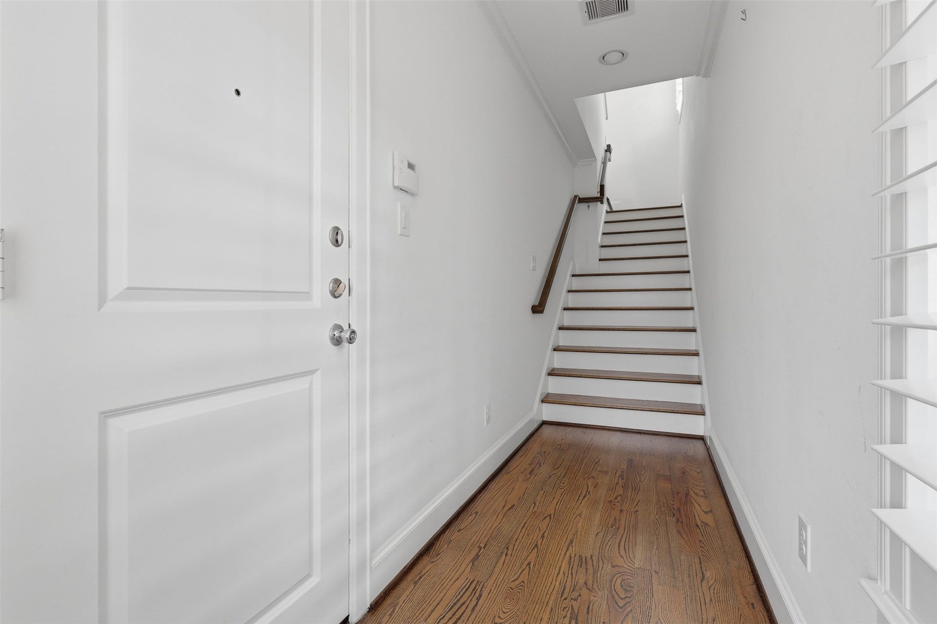 3302 Audley Street, #126, Houston, TX 77098 Welcoming entry with door to garage on left.