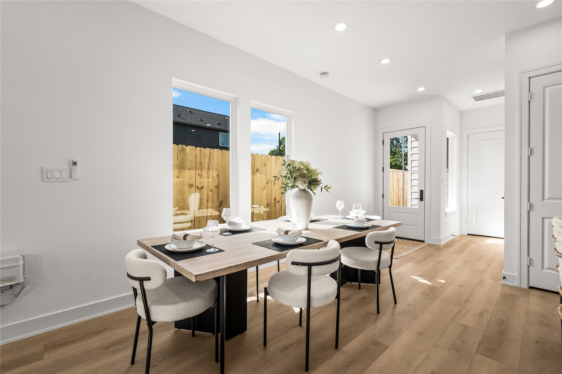 3012 & 3014 Beulah St, Houston, TX 77004 This bright corner of the dining area gets plenty of afternoon sunlight while still keeping your privacy. The clean white walls are ready for your own artwork, and the light continues through the space to keep everything matching and modern.