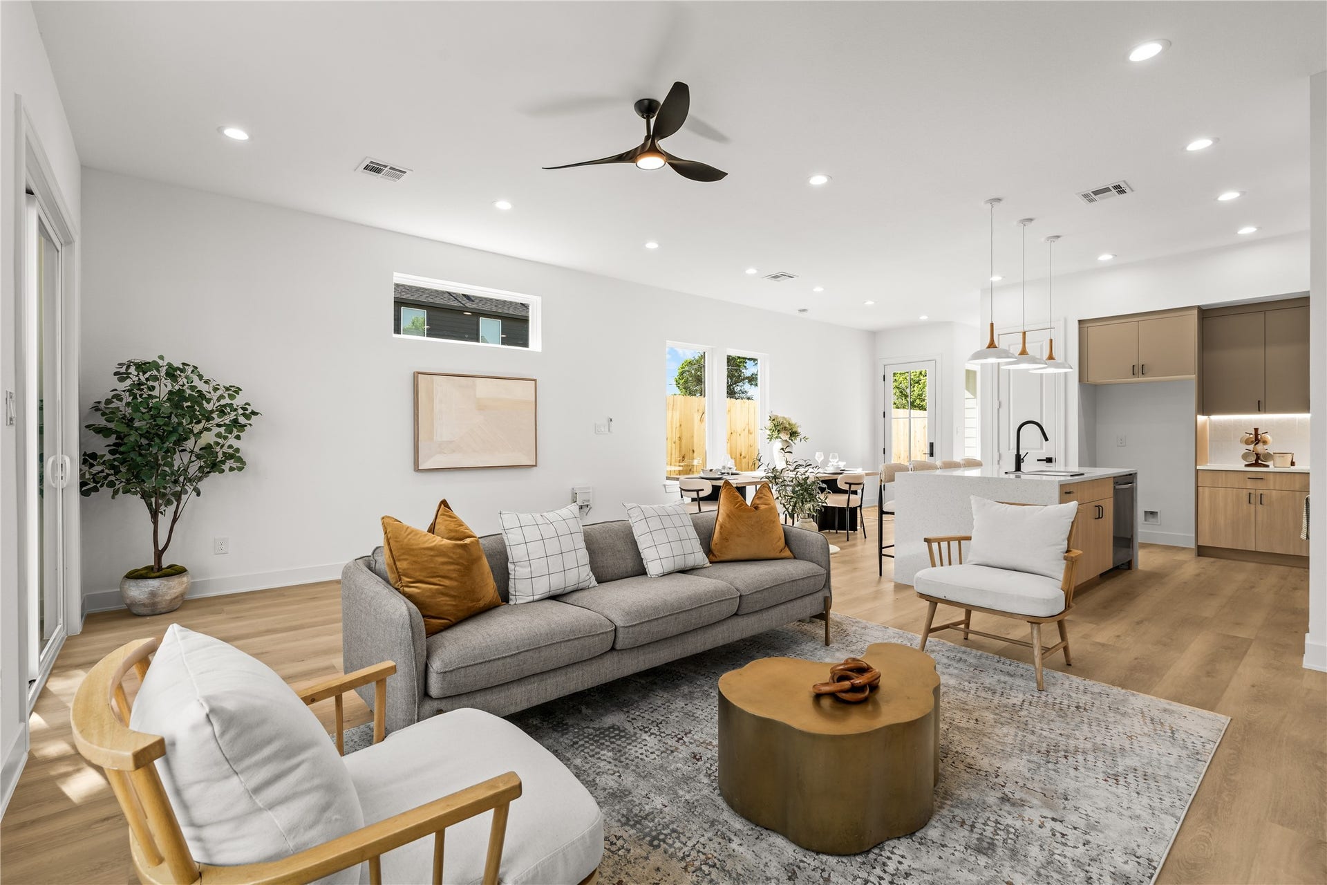 3012 & 3014 Beulah St, Houston, TX 77004 This view shows just how spacious the open-concept living area is. The layout easily fits a large sofa and accent chairs, keeping the living room, dining area, and kitchen completely connected and open.