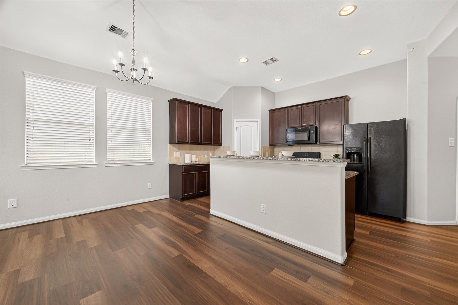 1018 Pleasant Bend, Conroe, TX 77301 From morning coffee to dinner around the table, this inviting dining area offers a lovely spot to start and end your day.