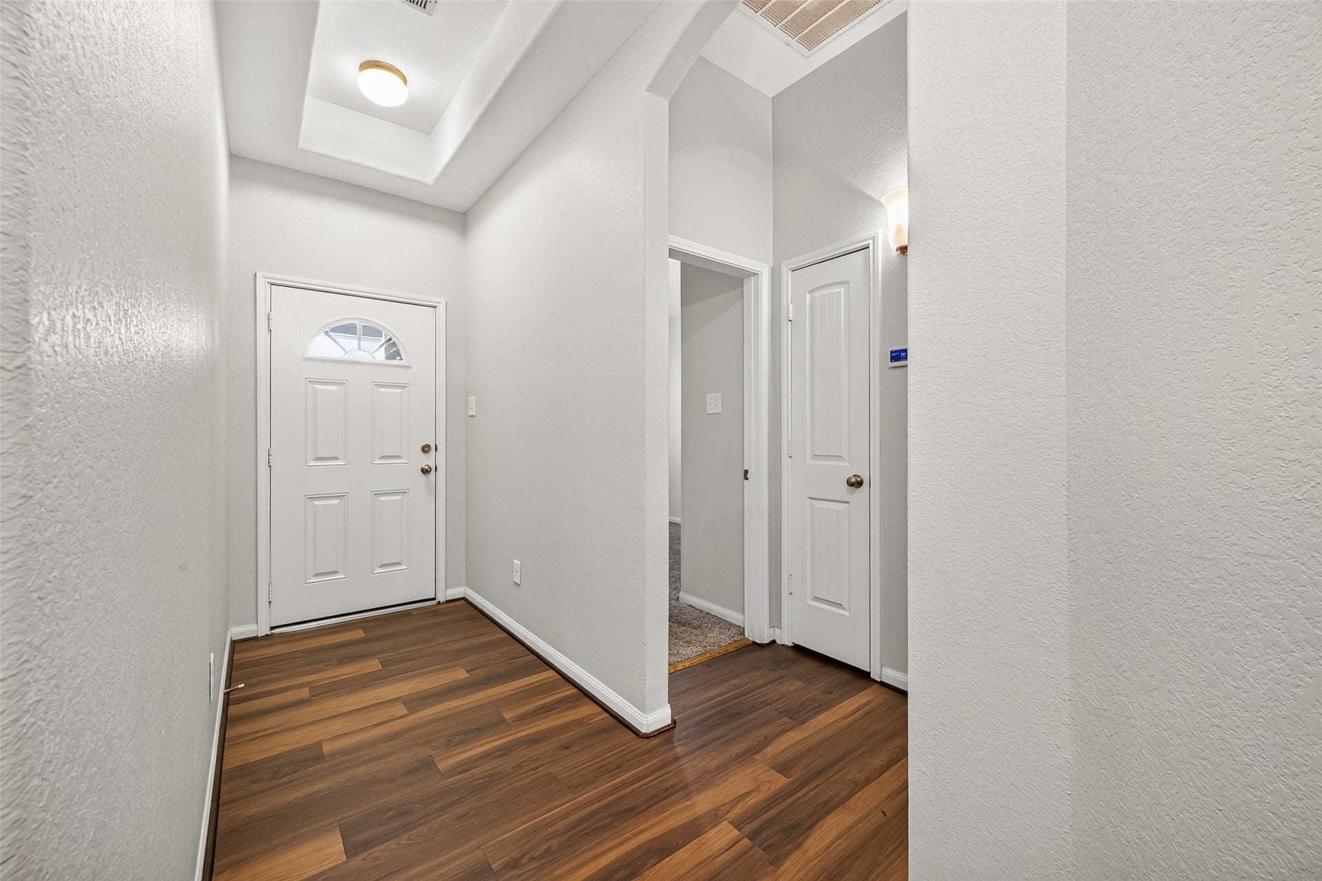 1018 Pleasant Bend, Conroe, TX 77301 Fresh interior paint and attractive wood-look laminate flooring give the home a clean, updated feel.