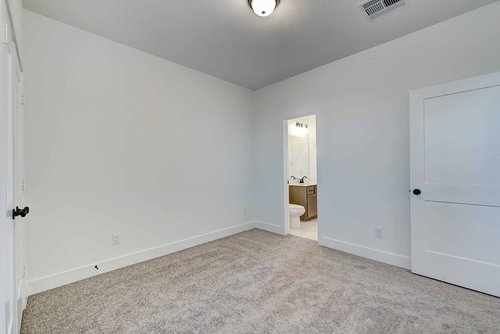 Bedroom 3 also features direct access to the shared bathroom connecting to Bedroom 2, adding convenience and flexibility to the upstairs layout.