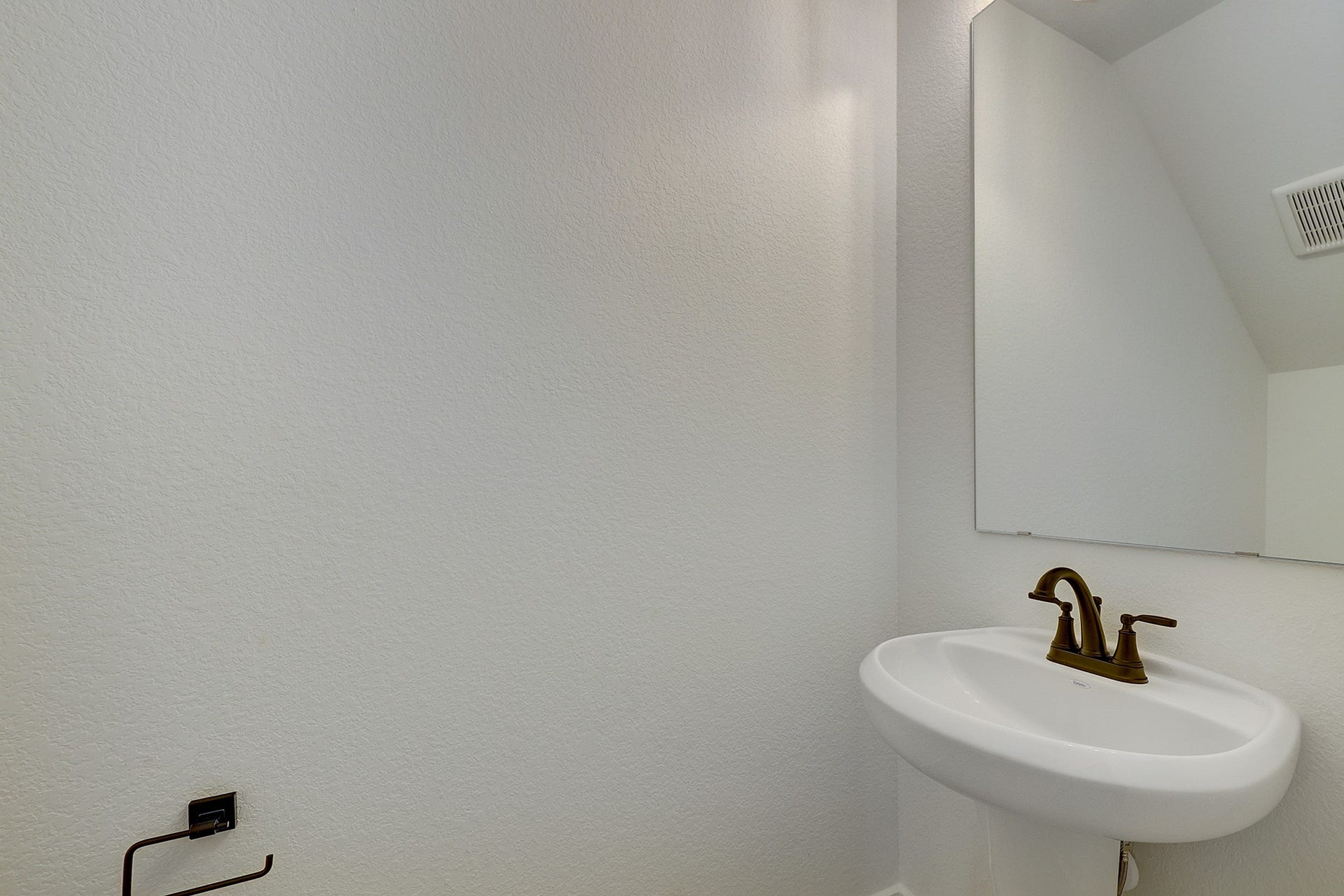 Convenient downstairs powder bath.