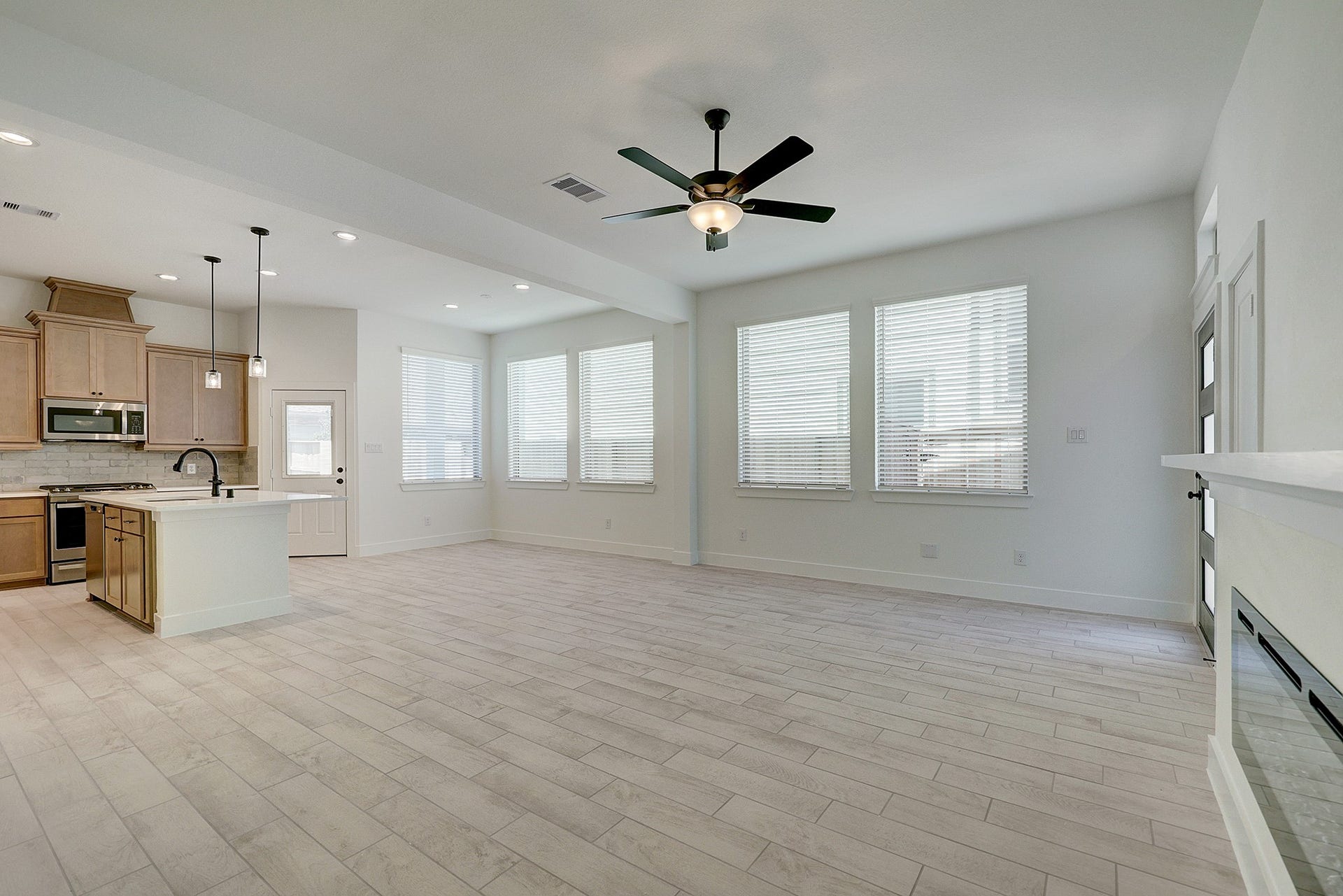 Open living space flows seamlessly into the kitchen.
