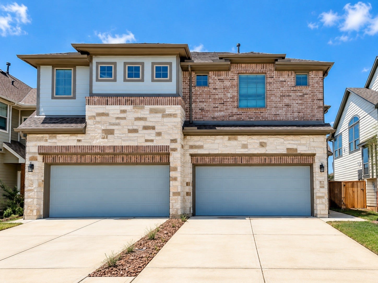 Beautiful front elevation with attached 2-car garage.