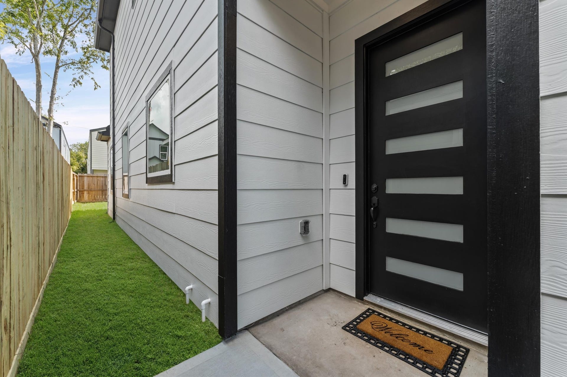 8132 Sunnyhill Street, Houston, TX 77088 Private Gated Front Entrance: Welcome home through your own gated entryway, offering an added sense of privacy and security before reaching the front door. This thoughtfully designed outdoor entrance creates a welcoming first impression while blending modern style with everyday peace of mind.
