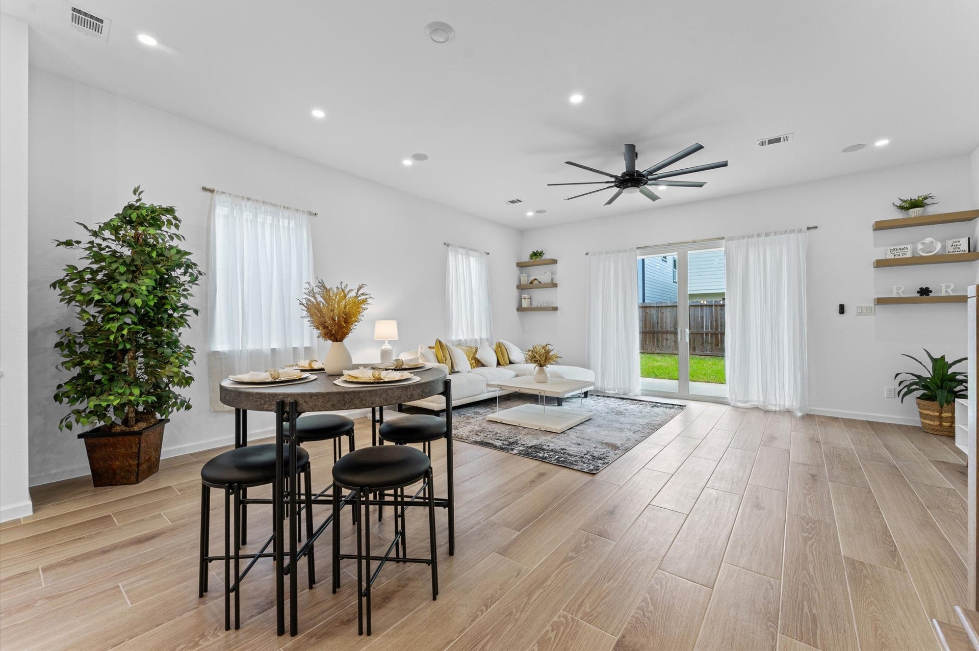 8132 Sunnyhill Street, Houston, TX 77088 Open-Concept Dining Area
Beautifully positioned between the kitchen and living room, this inviting dining space offers the perfect setting for everything from casual family dinners to memorable holiday celebrations. An open-concept design that brings everyone together while allowing each space to shine.