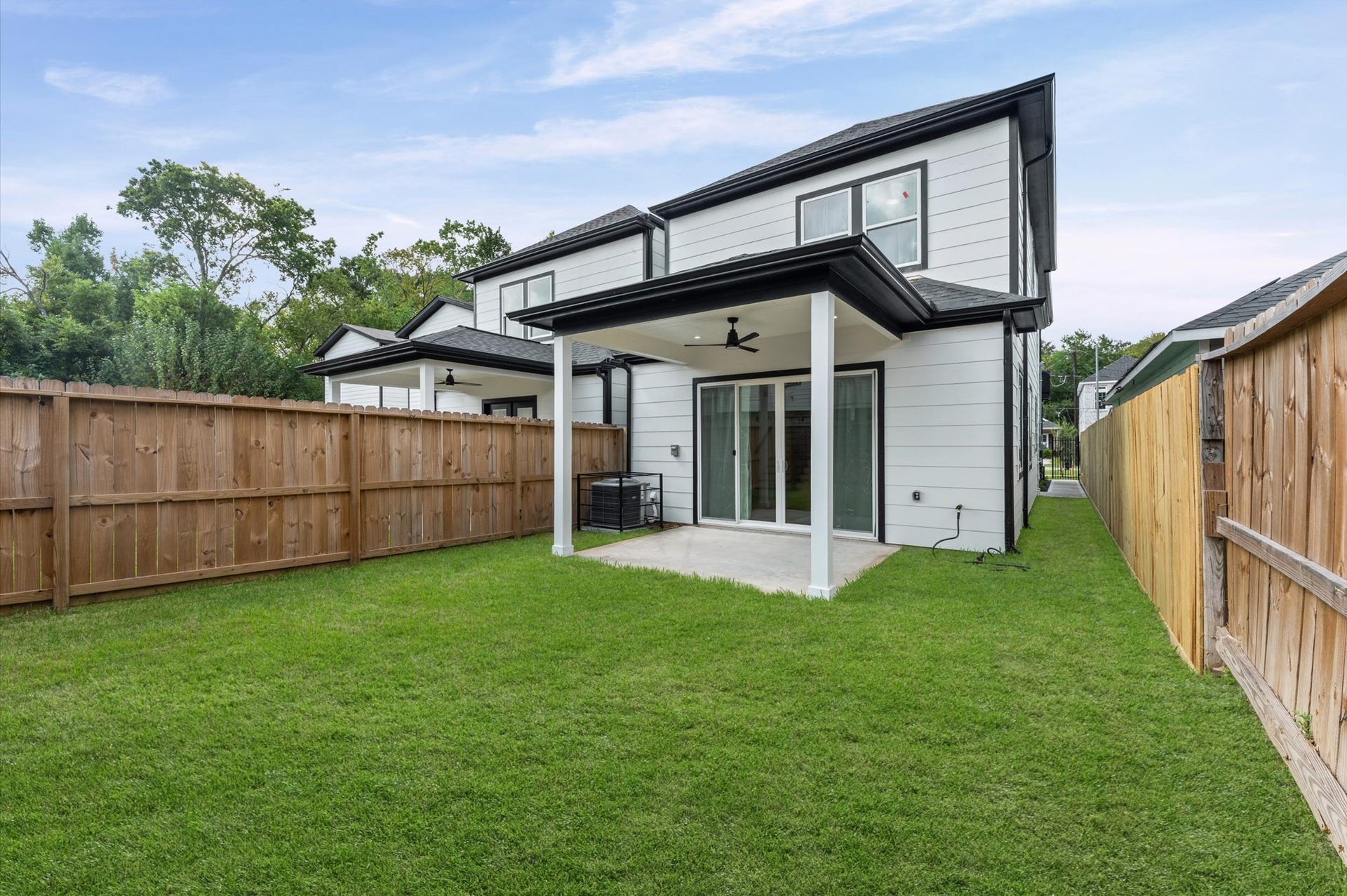 8132 Sunnyhill Street, Houston, TX 77088 Full Backyard View: Enjoy your own private outdoor retreat featuring a beautifully maintained green lawn, full privacy fencing, and a spacious covered patio. Thoughtfully designed for outdoor entertaining, family gatherings, or simply unwinding in the comfort of your own backyard.